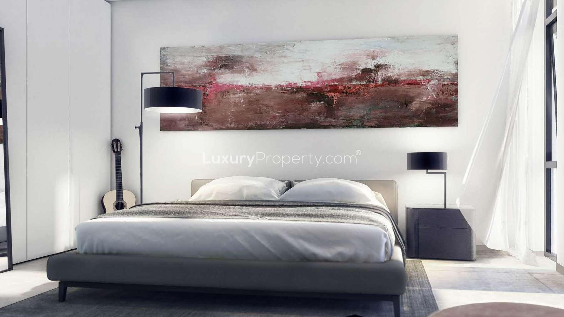 Modern living room in East Village apartment, Aljada, Sharjah with stylish decor and natural light