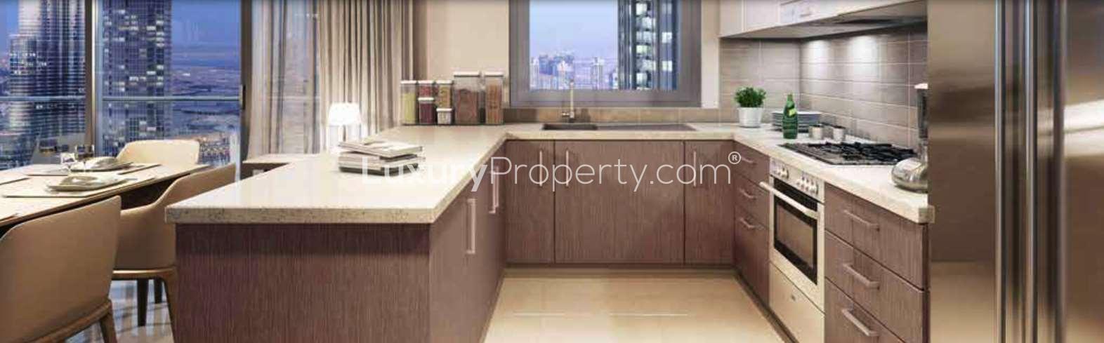 Forte apartment building in Downtown Dubai's Opera District at dusk, showcasing luxury living