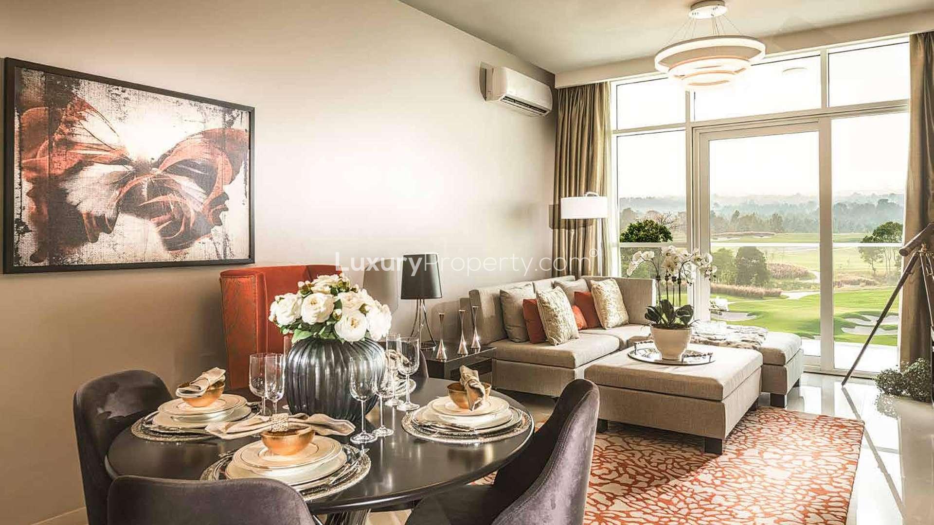 Modern living room in Kiara Apartments, Dubailand with elegant decor and dining area