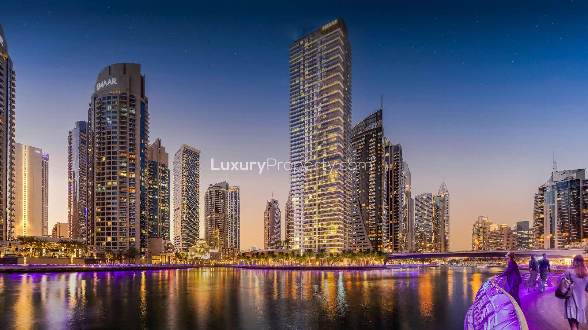 "Stunning Marina Shores apartment tower overlooking Dubai Marina waterfront skyline, ideal for sale.",Dubai Marina skyline view from Marina Shores, featuring waterfront skyscrapers at dusk