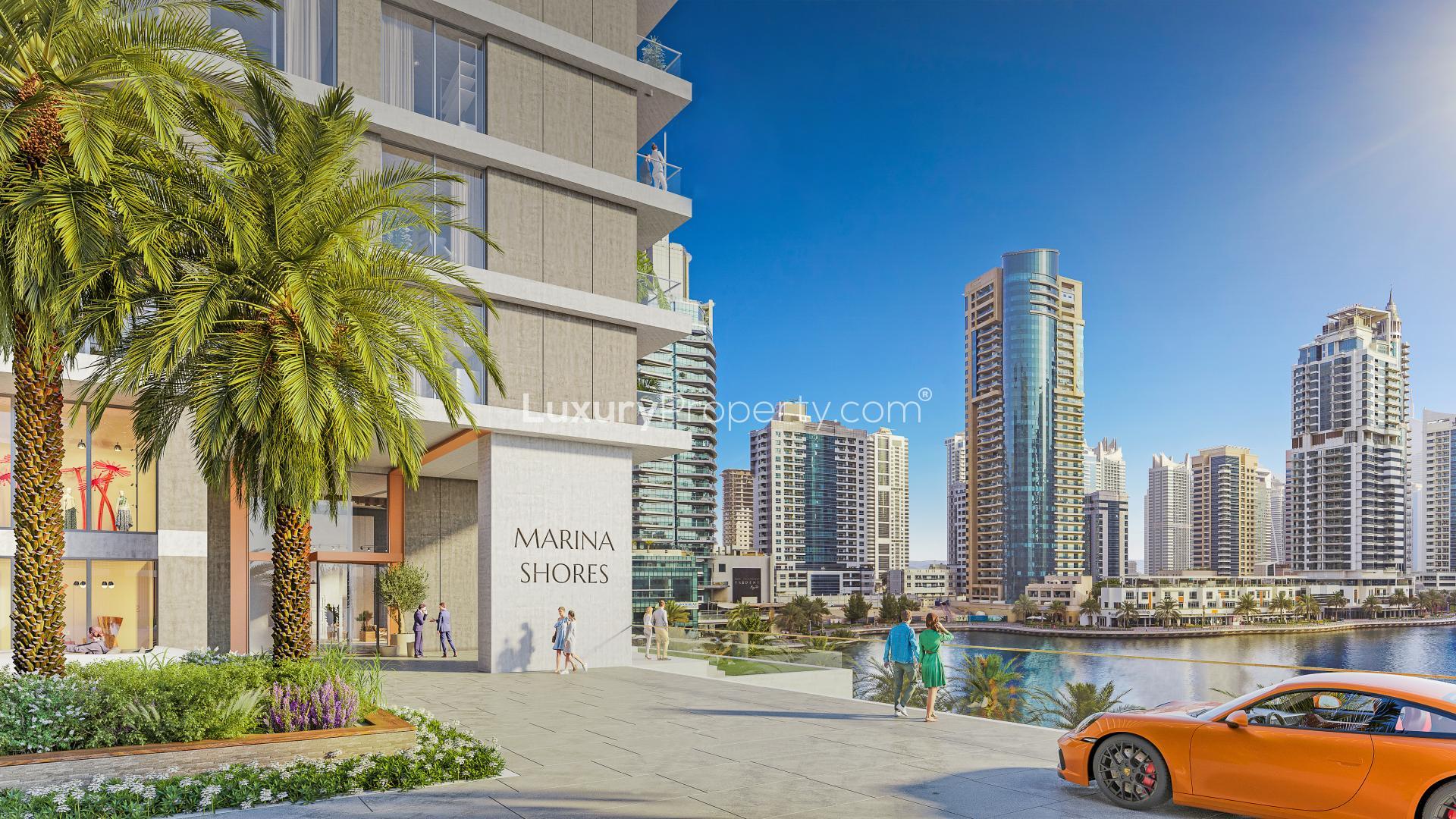 "Marina Shores apartment exterior with Dubai Marina skyline and waterfront view, studio for sale.","Marina Shores Dubai Marina waterfront view, modern apartment building, vibrant community life.",Luxury Marina Shores apartment balcony with stunning Dubai Marina skyline view at night.