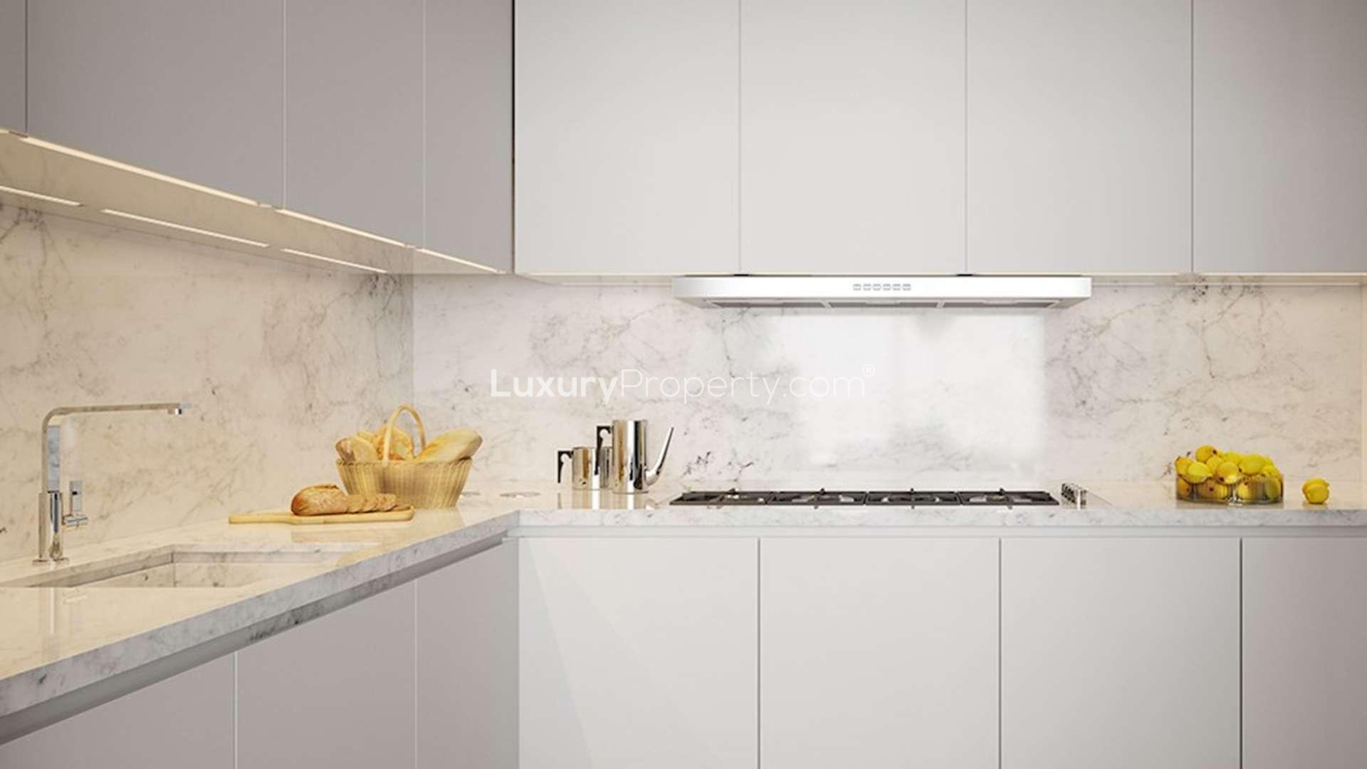 Modern dining area in Misk Apartments, Aljada, Sharjah with elegant decor and lighting