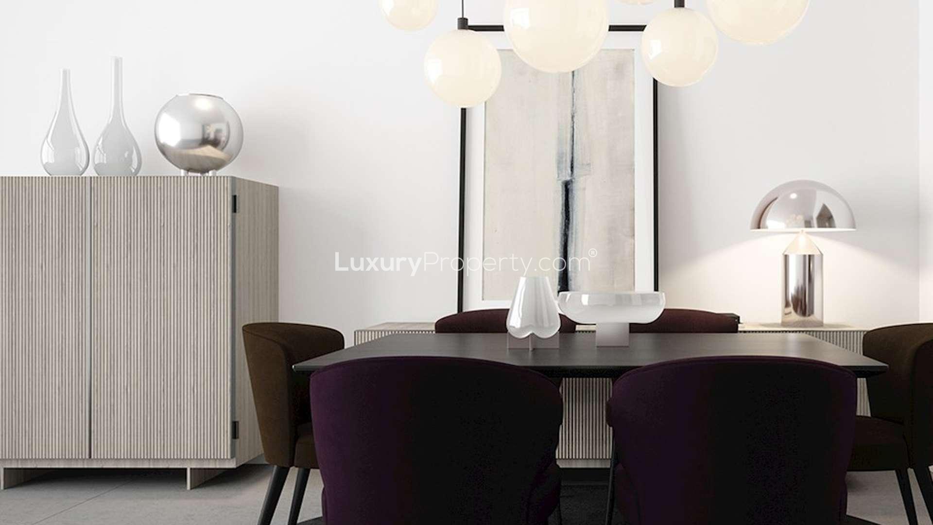 Modern dining and living area in Misk Apartments, Aljada, Sharjah for sale