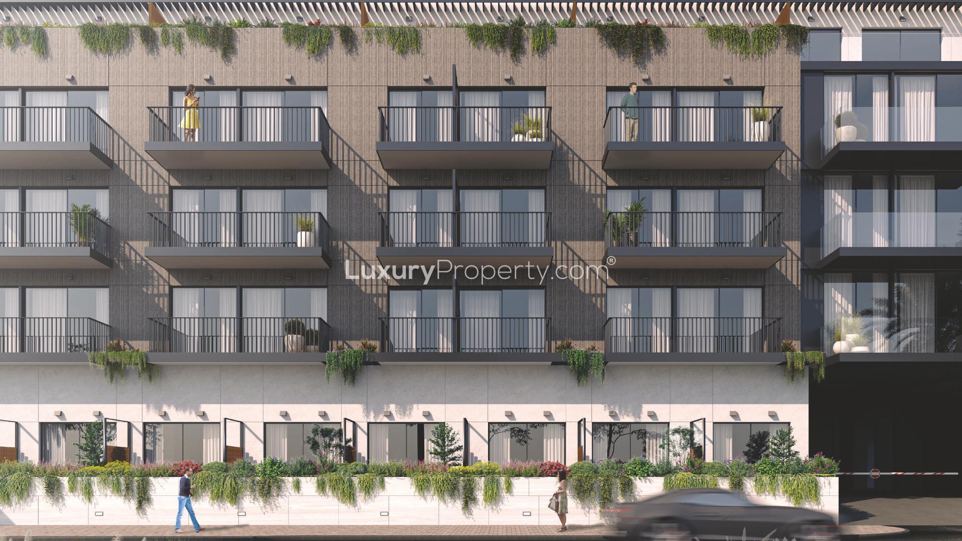 Modern living room and kitchen in Oakley Square Residences, JVC apartment for sale