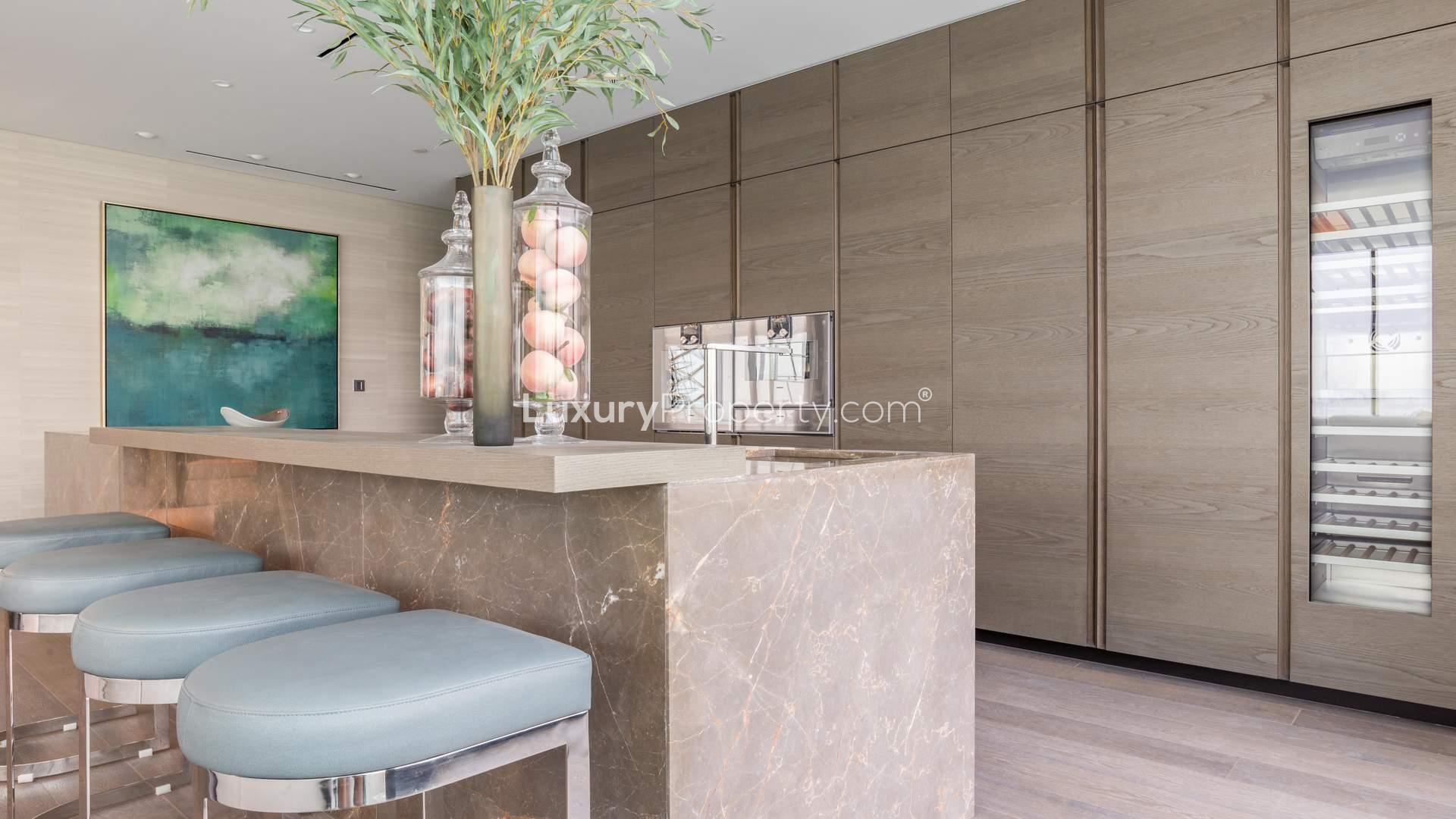 Luxurious studio living area at One Palm, Palm Jumeirah, featuring modern decor and lighting