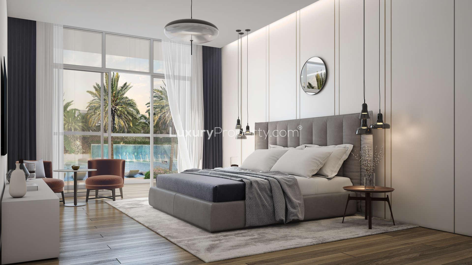 Modern kitchen in luxury Pantheon Elysee apartment, Jumeirah Village Circle, with sleek design