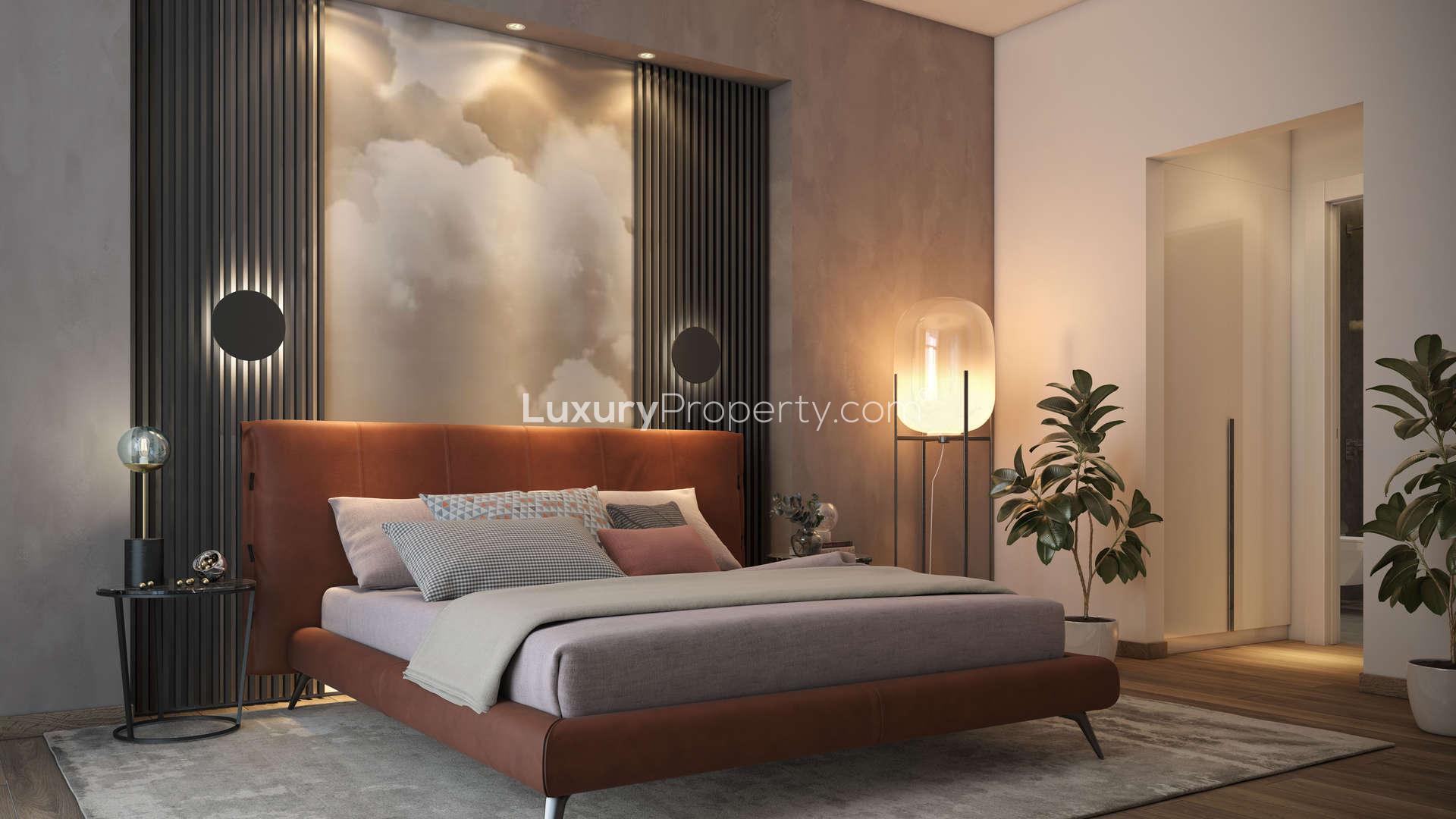 Luxurious bedroom in Pantheon Elysee apartment, Jumeirah Village Circle with scenic view