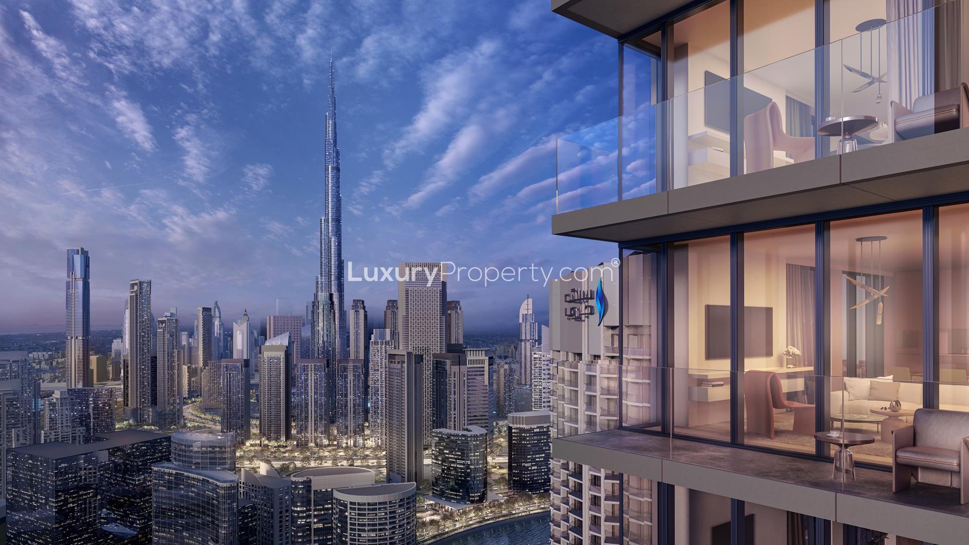 "Luxury studio apartment view at Peninsula Four, The Plaza, Business Bay skyline backdrop.",Modern apartment building facade at Peninsula Four, The Plaza, Business Bay, Jumeirah Village Circle
