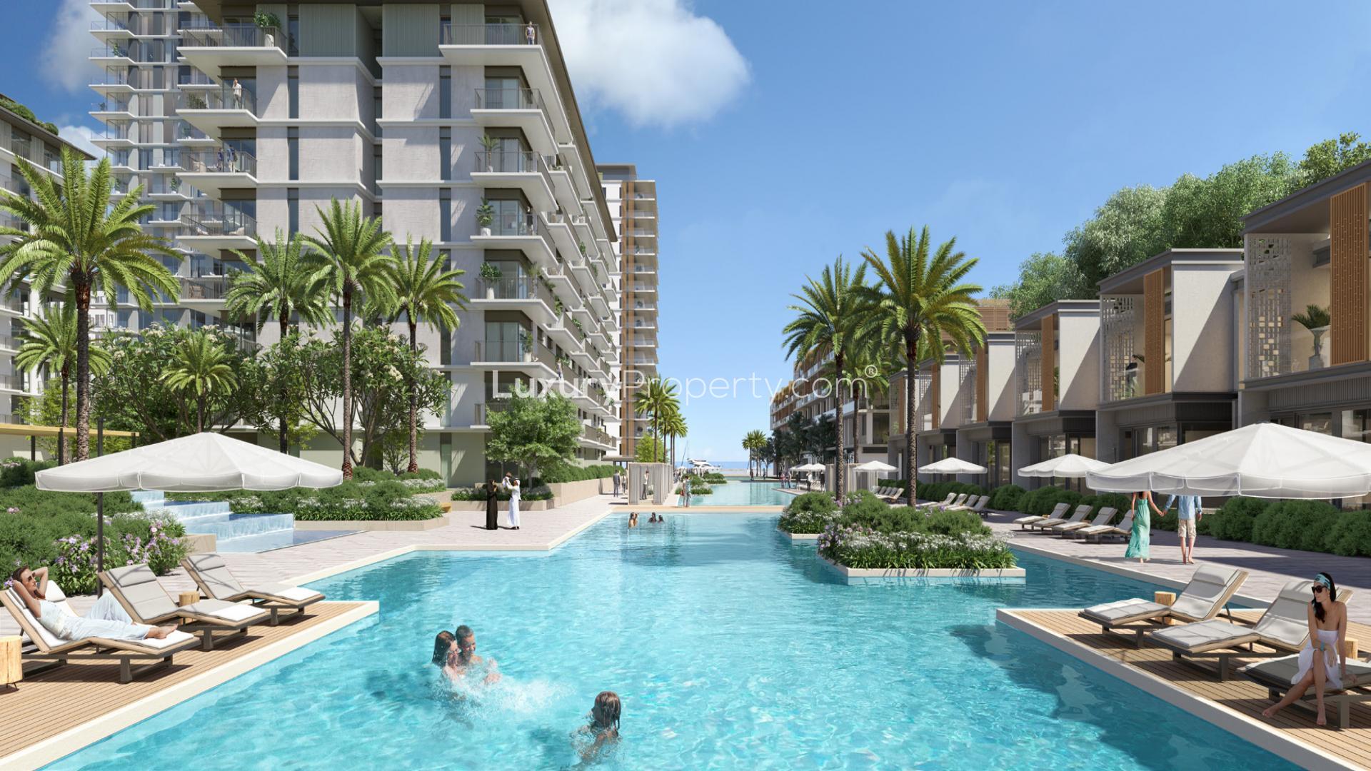 Aerial view of waterfront apartments in Mina Rashid, featuring luxury marina and yachts