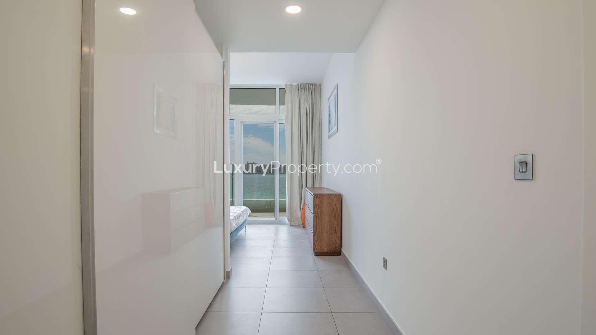 Modern kitchen in Royal Bay studio apartment, Palm Jumeirah, with sleek countertops and appliances