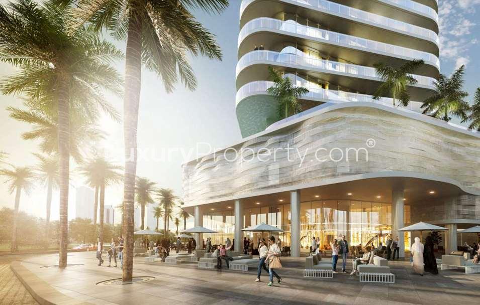 "RP Heights infinity pool with stunning Downtown Dubai skyline view, luxury apartment for sale.",Exterior view of RP Heights apartment building in Downtown Dubai, featuring modern architecture