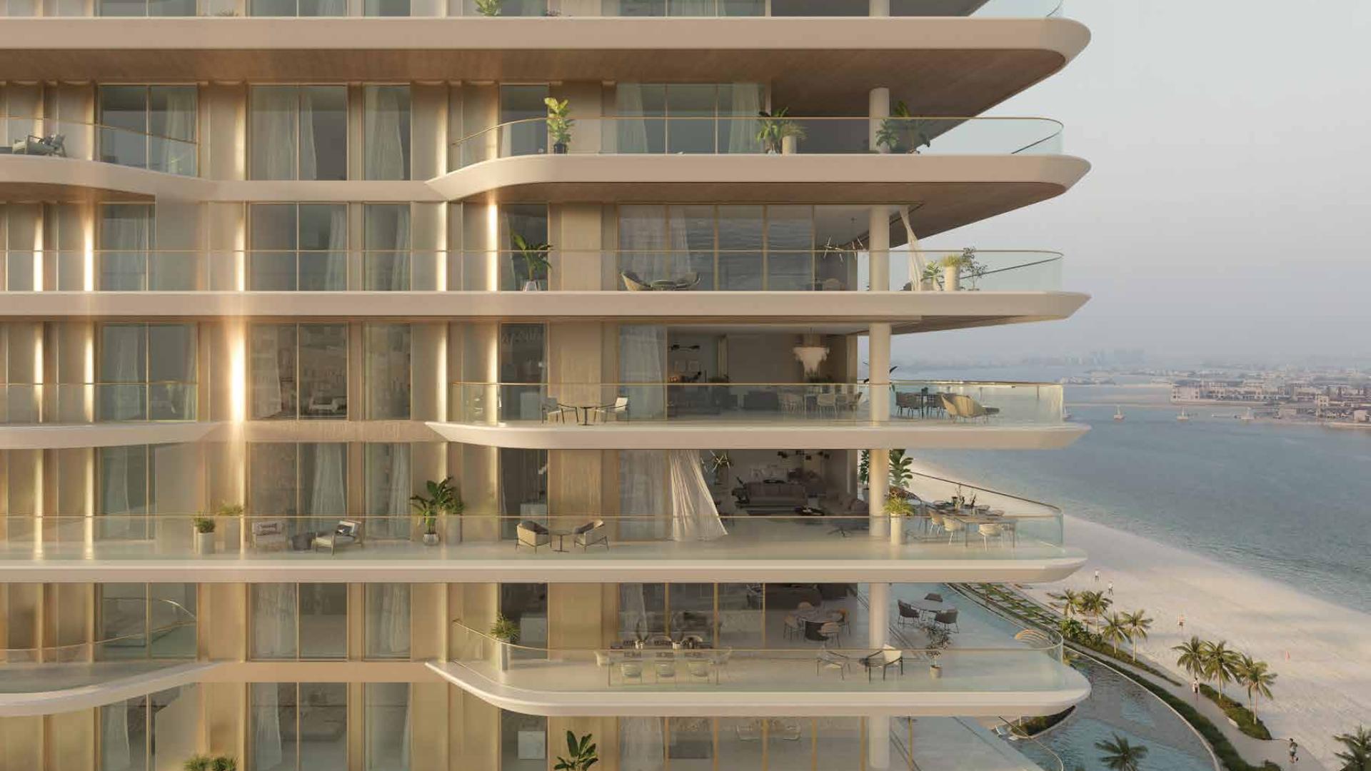 "Serenia Living studio apartment with beachfront view in Palm Jumeirah, Dubai for sale.","Serenia Living beachfront apartment view, Palm Jumeirah, Dubai - luxury residential property for sale.",Exterior view of Serenia Living beachfront apartment in Palm Jumeirah, Dubai at sunset