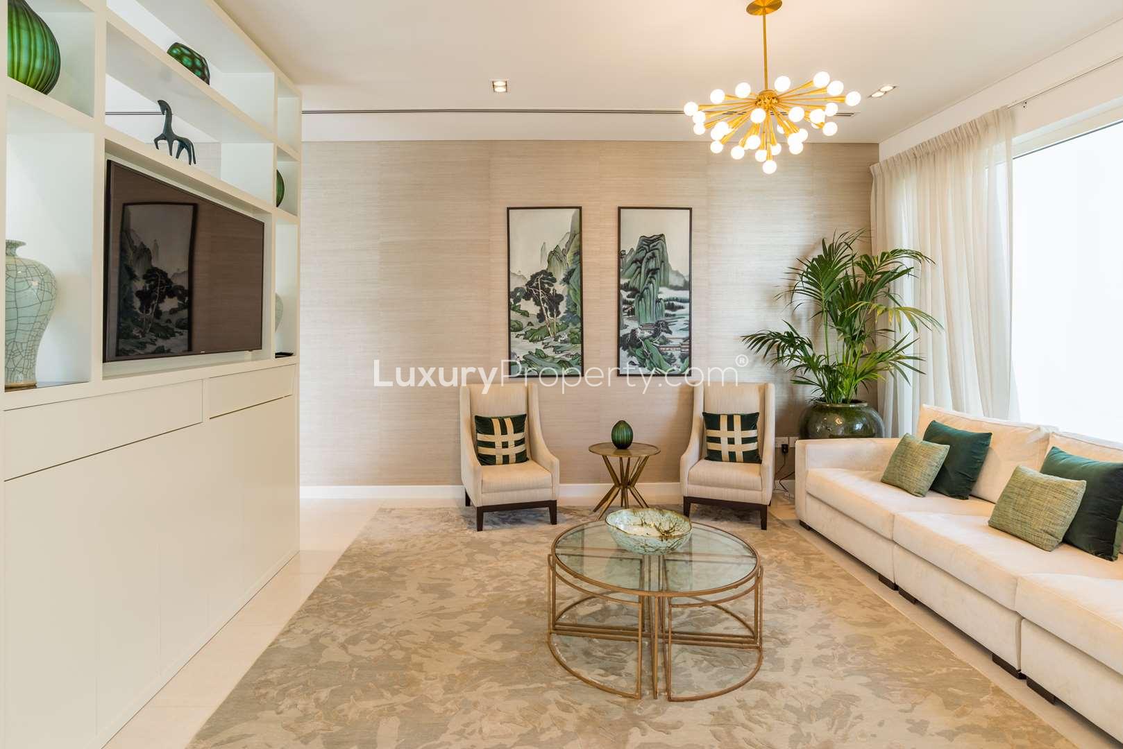 Luxurious dining area in The Nest villa, Al Barari, featuring elegant decor and greenery