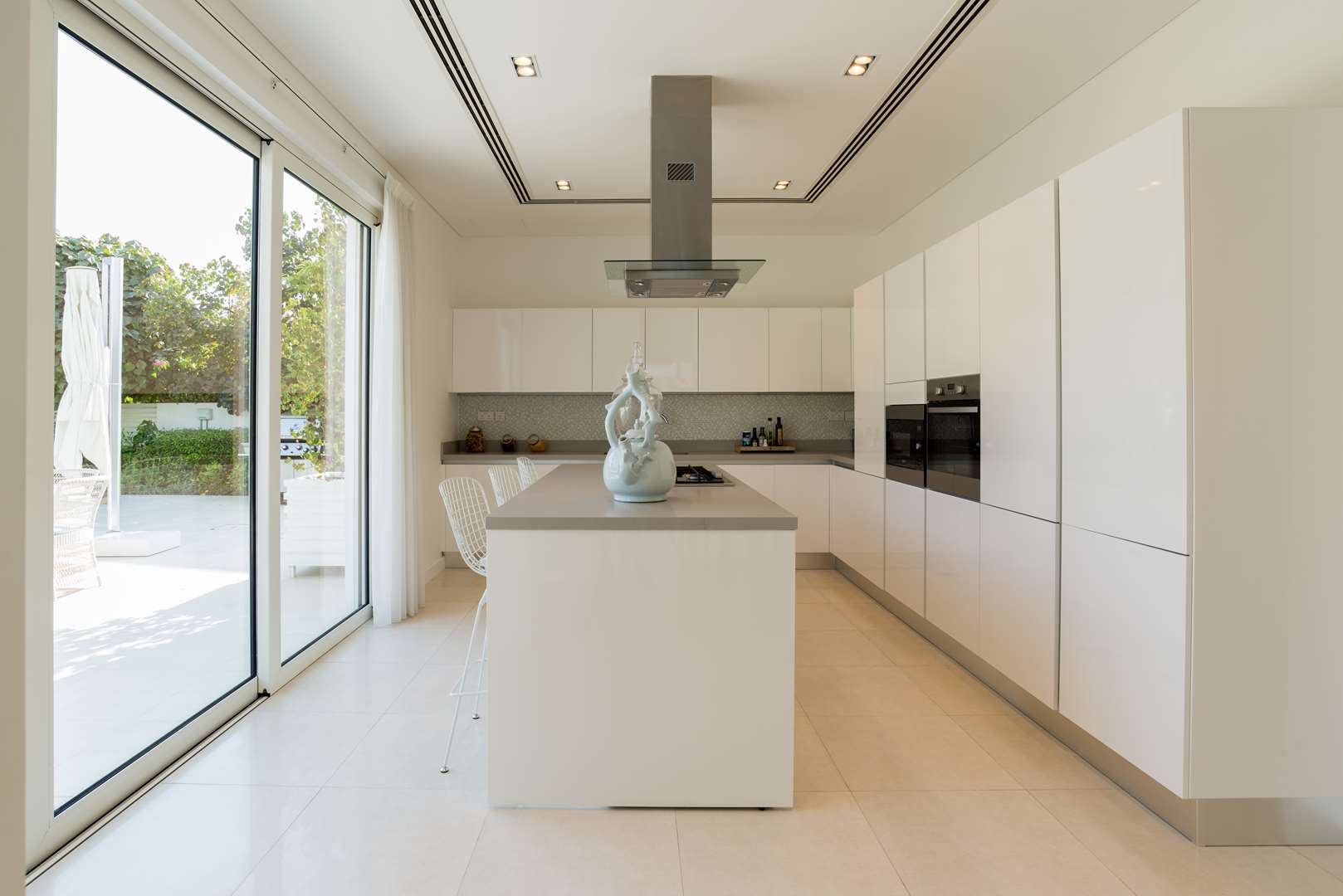 Modern villa exterior with pool and garden at The Nest, Al Barari, for sale