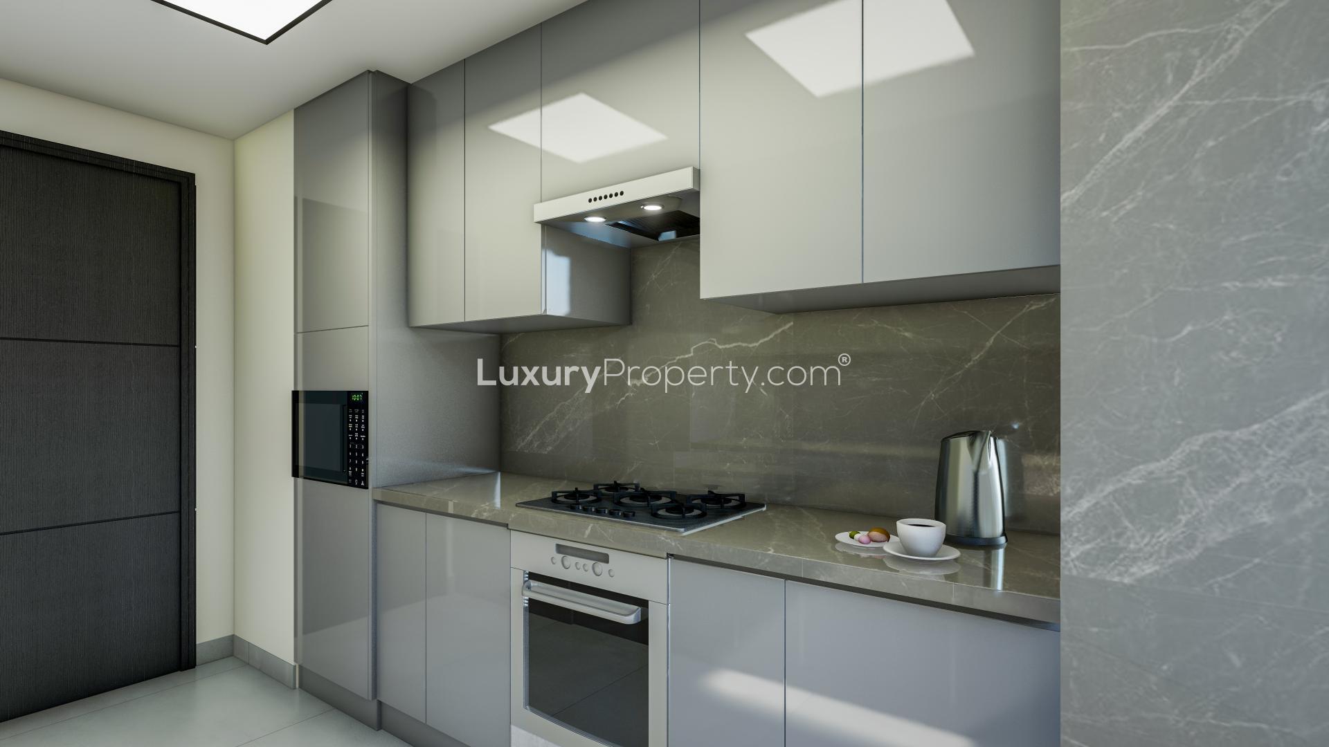 Modern studio apartment living room in The Paragon, Business Bay, with elegant furnishings