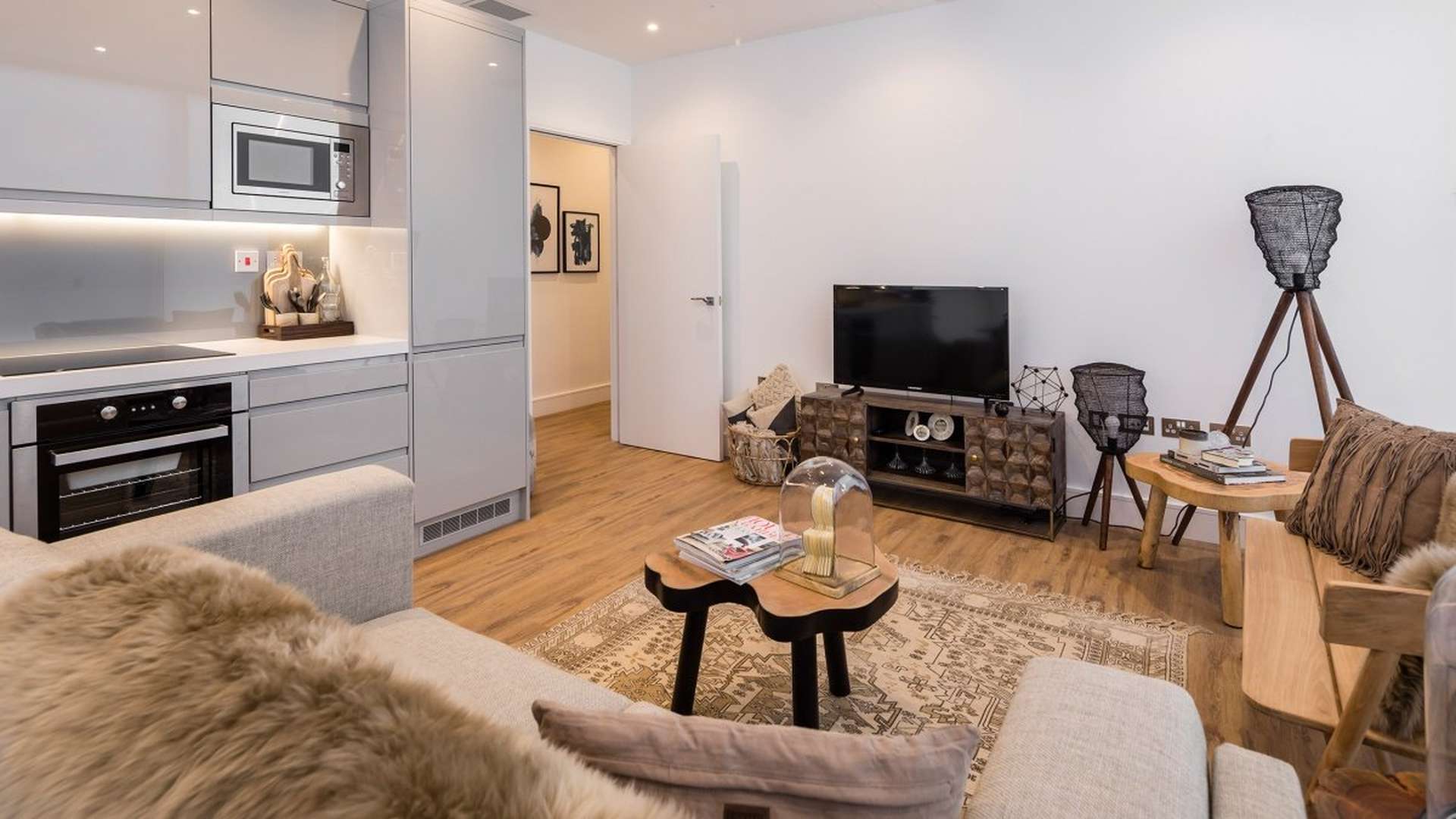 Modern kitchen and dining area in Timber Yard luxury apartment, Birmingham City Centre