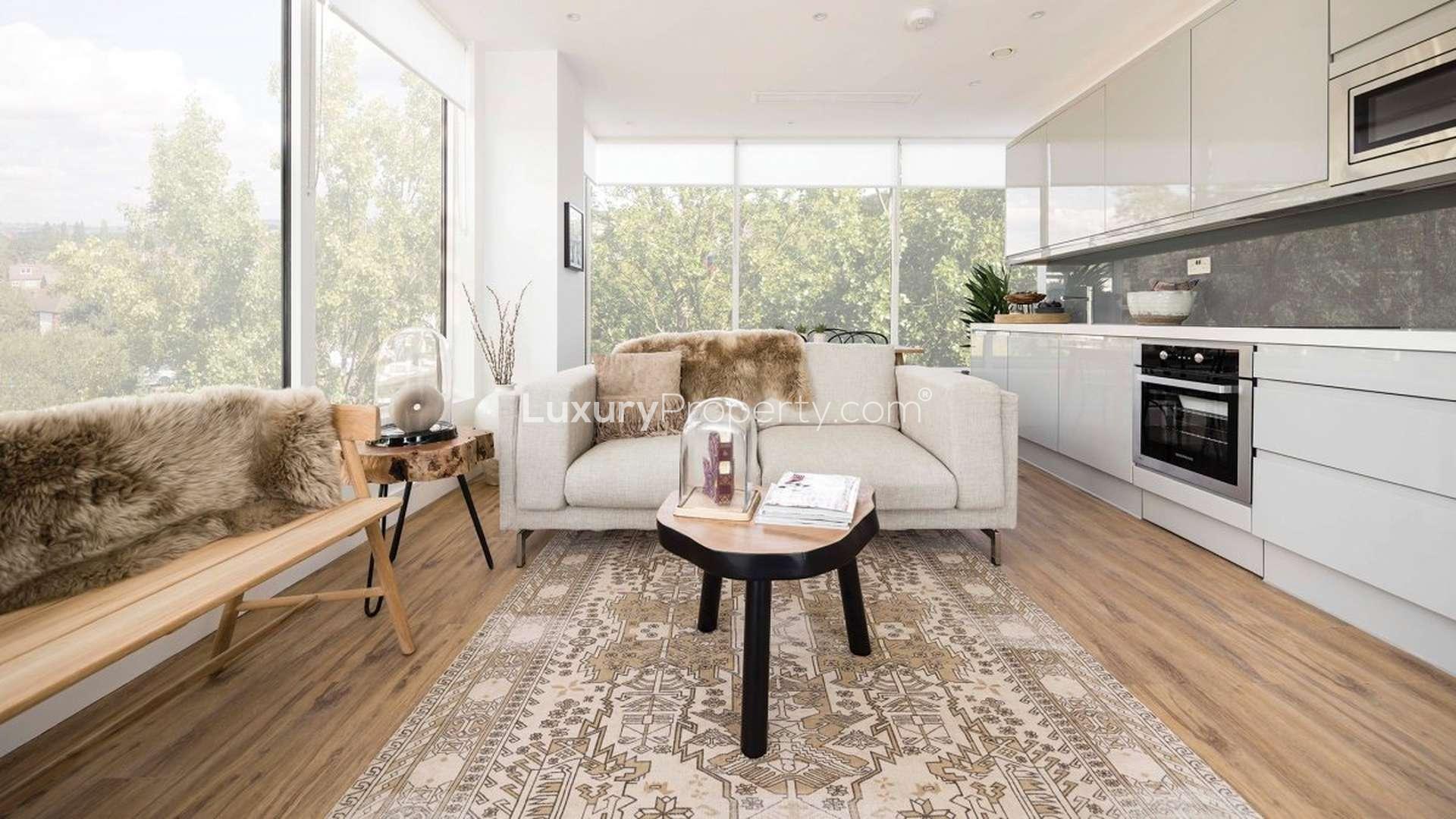 Luxury living room in Westgate House apartment, West London with large windows and modern decor
