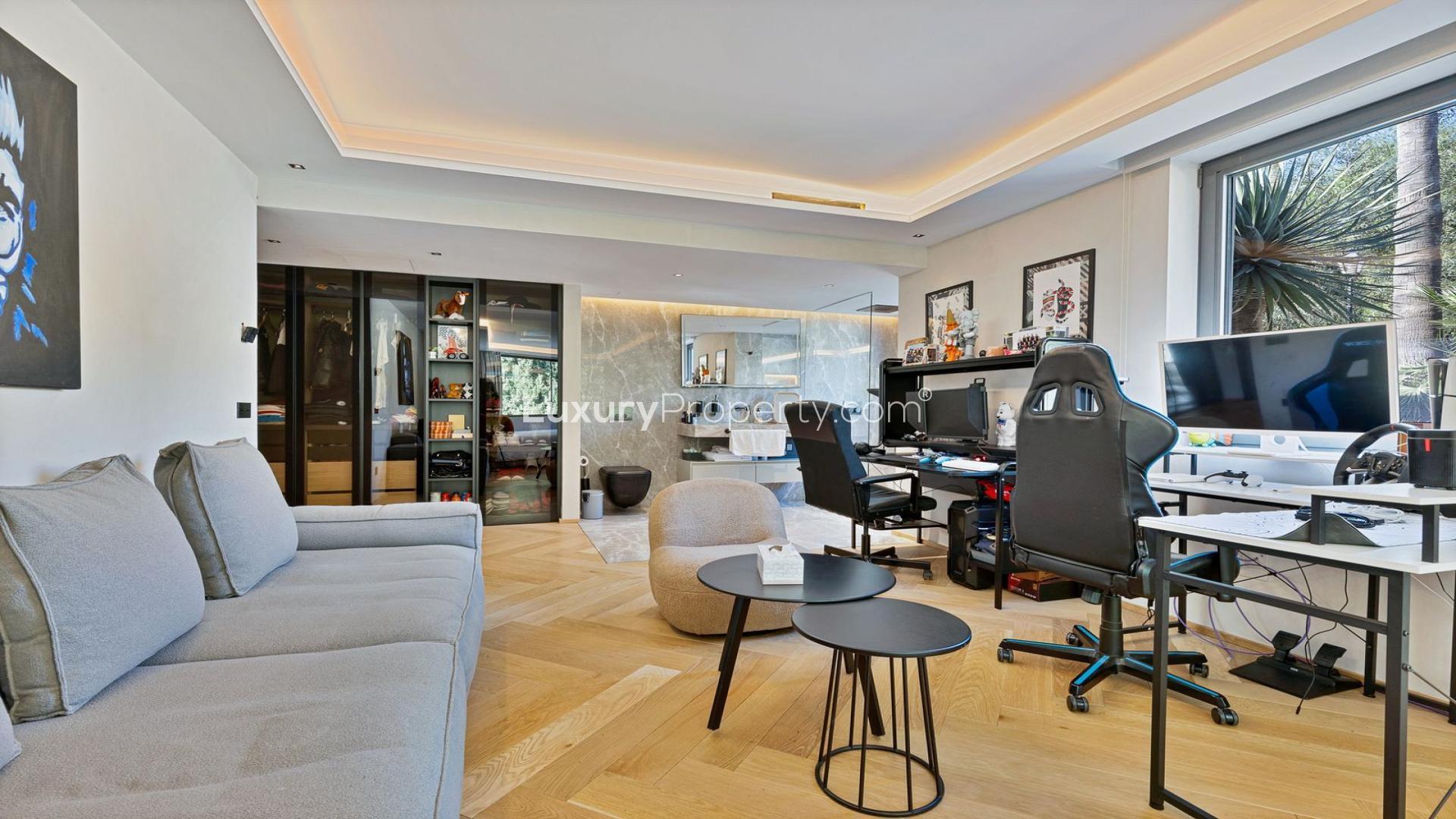 Luxurious living room in 5-bedroom villa, Benahavís, featuring modern design and scenic views