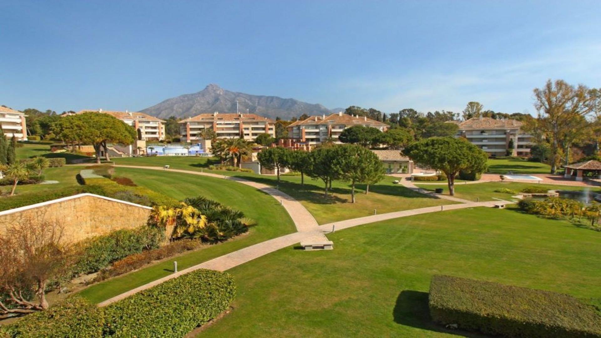 Luxury Marbella penthouse with stunning pool and sea views, lush gardens, for sale