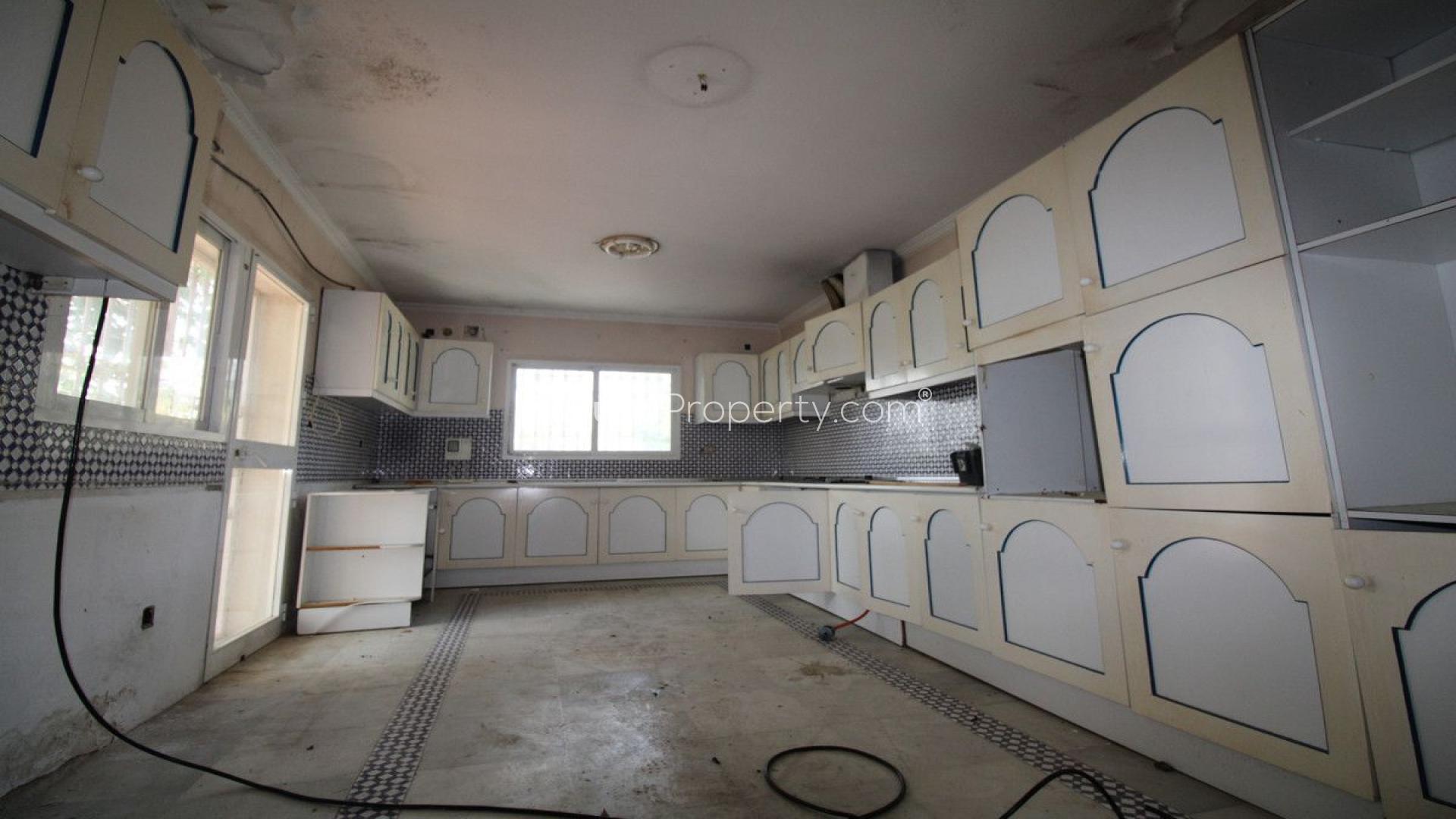 Sunny terrace of 5-bed villa in The Golden Mile, Marbella, with scenic views