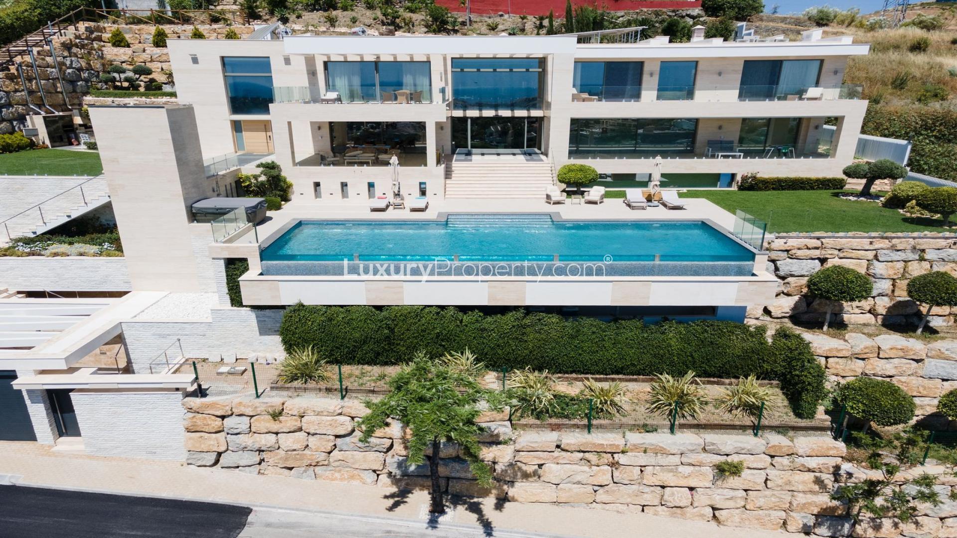 Luxury villa with pool, spacious patio, and mountain views in La Alqueria, Benahavis