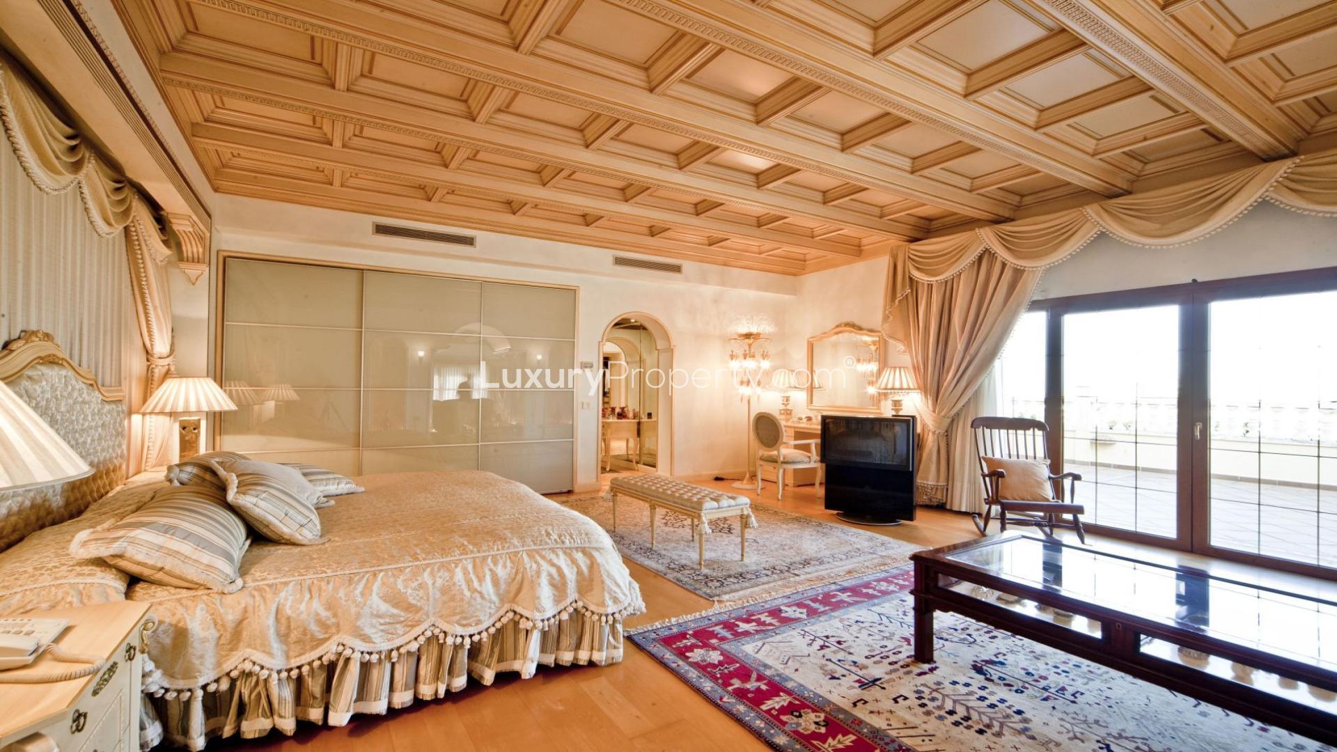 Luxurious villa foyer with grand staircase, elegant decor, near Puerto Banús, Málaga