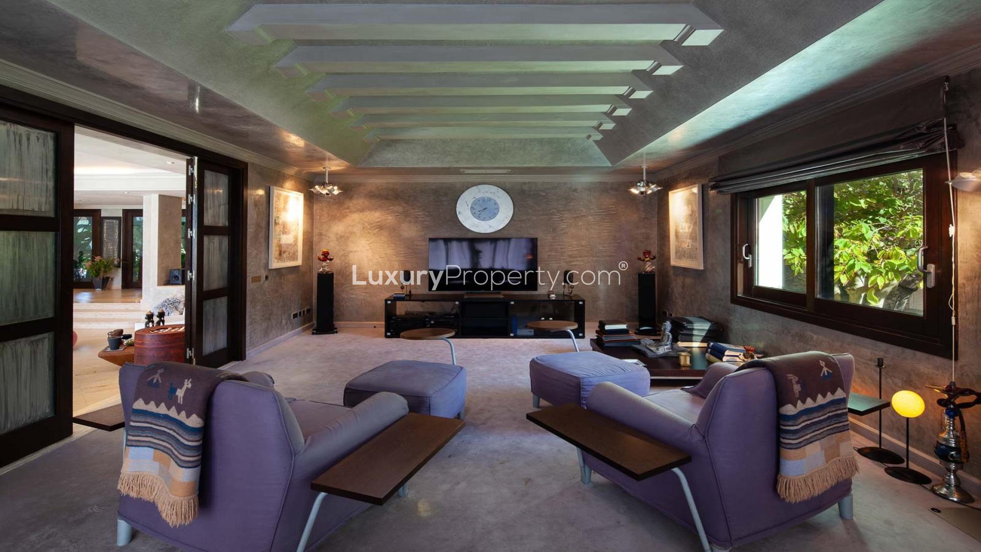 Luxurious living room in Estepona villa for sale, featuring modern decor and spacious layout