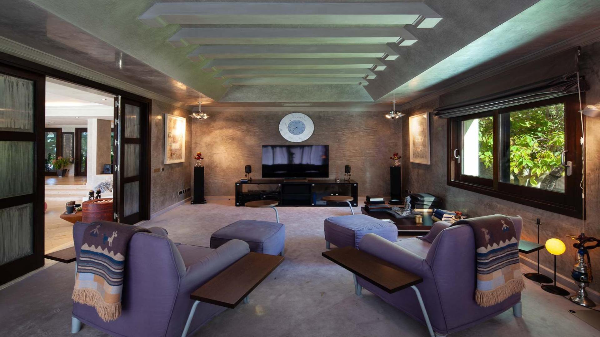 Luxurious living room in Estepona villa for sale, featuring modern decor and spacious layout