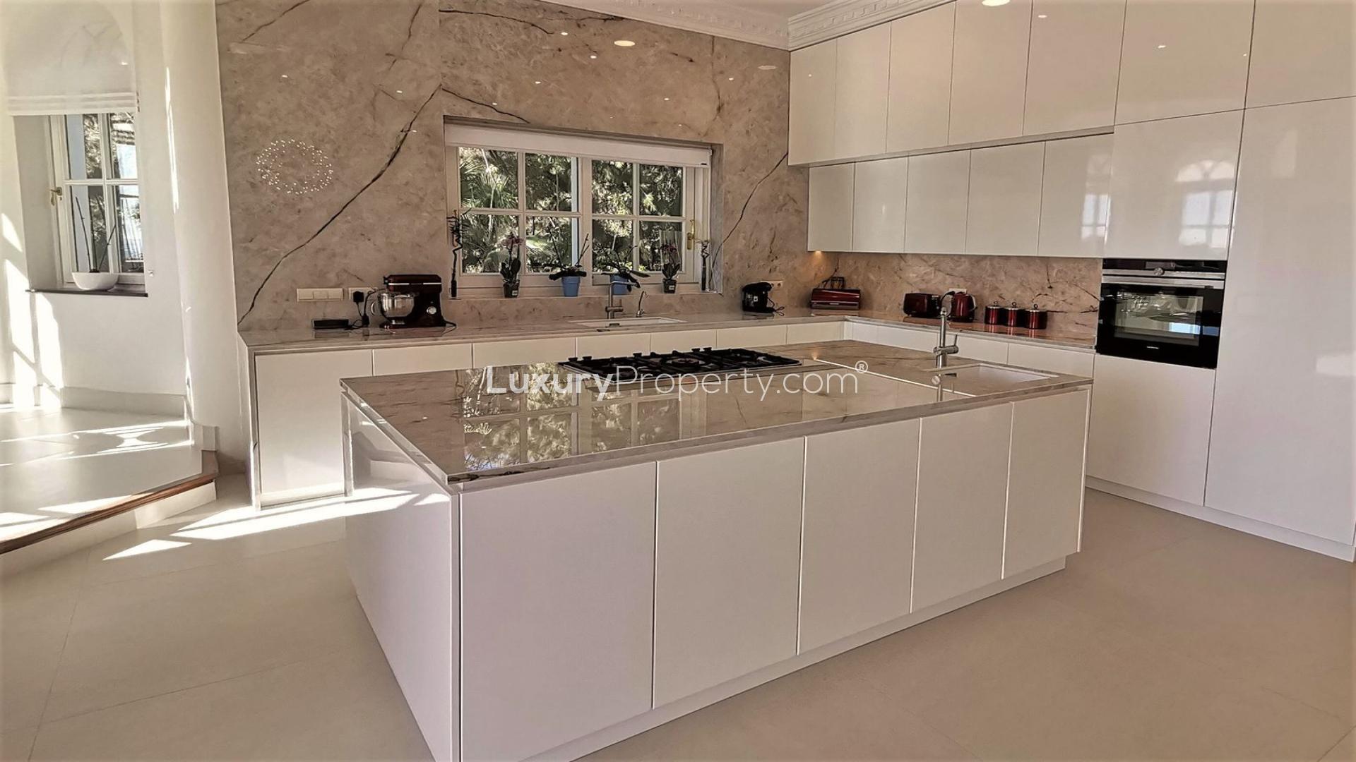 Elegant La Zagaleta villa living room with garden views and luxurious furnishings