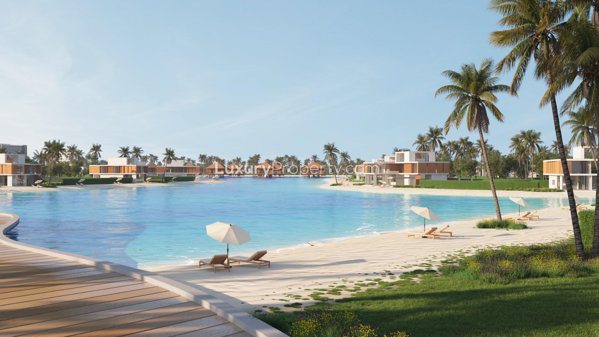 Prime villa plot, Arabian Hills Estate street view with palm trees and modern architecture
