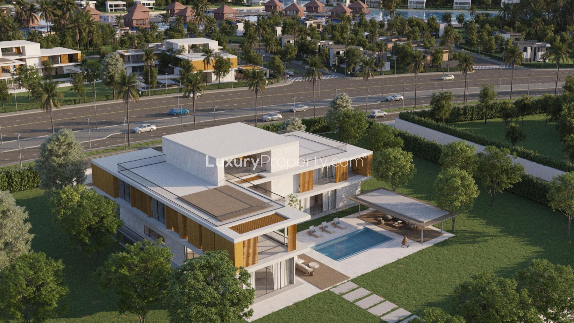 Entrance to Arabian Hills Estate, showcasing luxury villa plots for sale in prime location