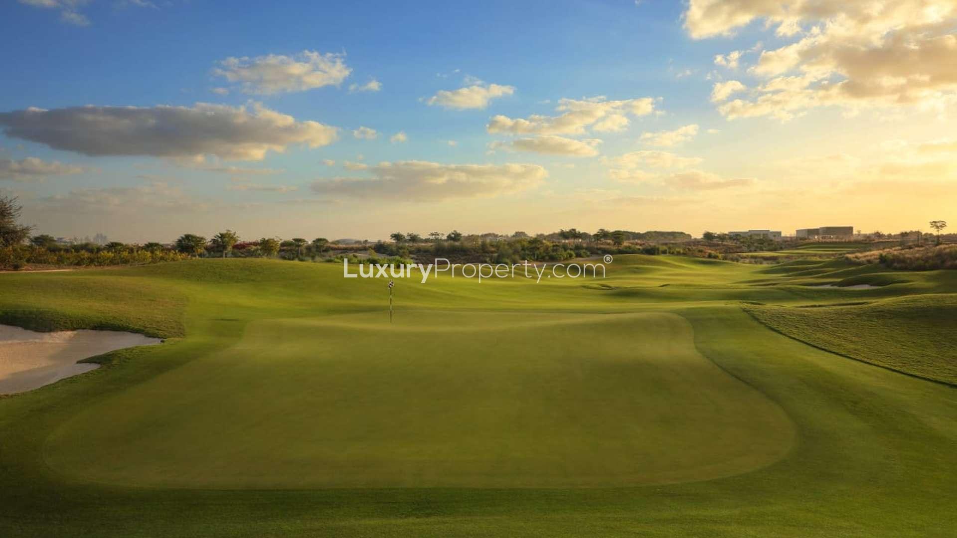 "Emerald Hills large plot view with Dubai skyline, Dubai Hills Estate property for sale.",Large plot at Emerald Hills, Dubai Hills Estate, overlooking lush green golf course landscape