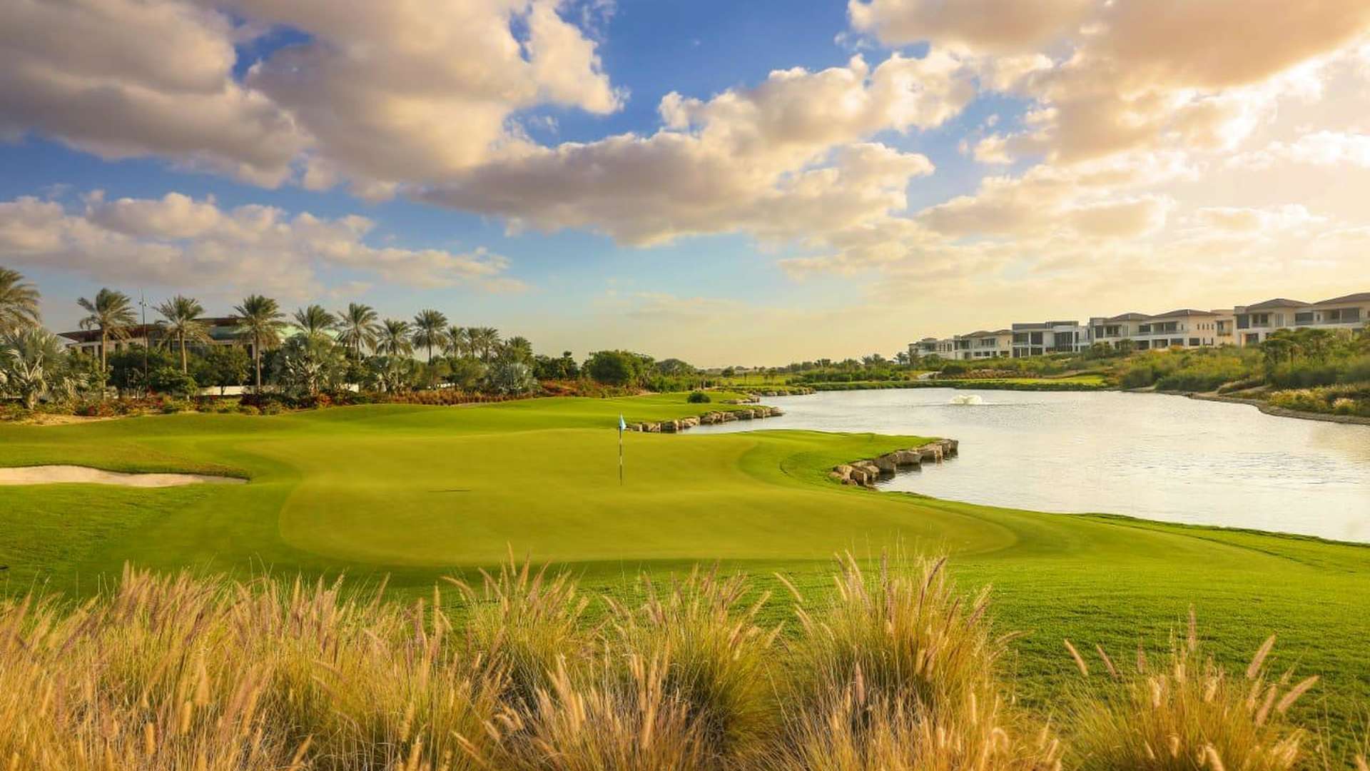 "Scenic golf course view at Dubai Hills Estate, Emerald Hills residential land for sale.",Residential land in Emerald Hills, Dubai Hills Estate, overlooking lush golf course and serene lake