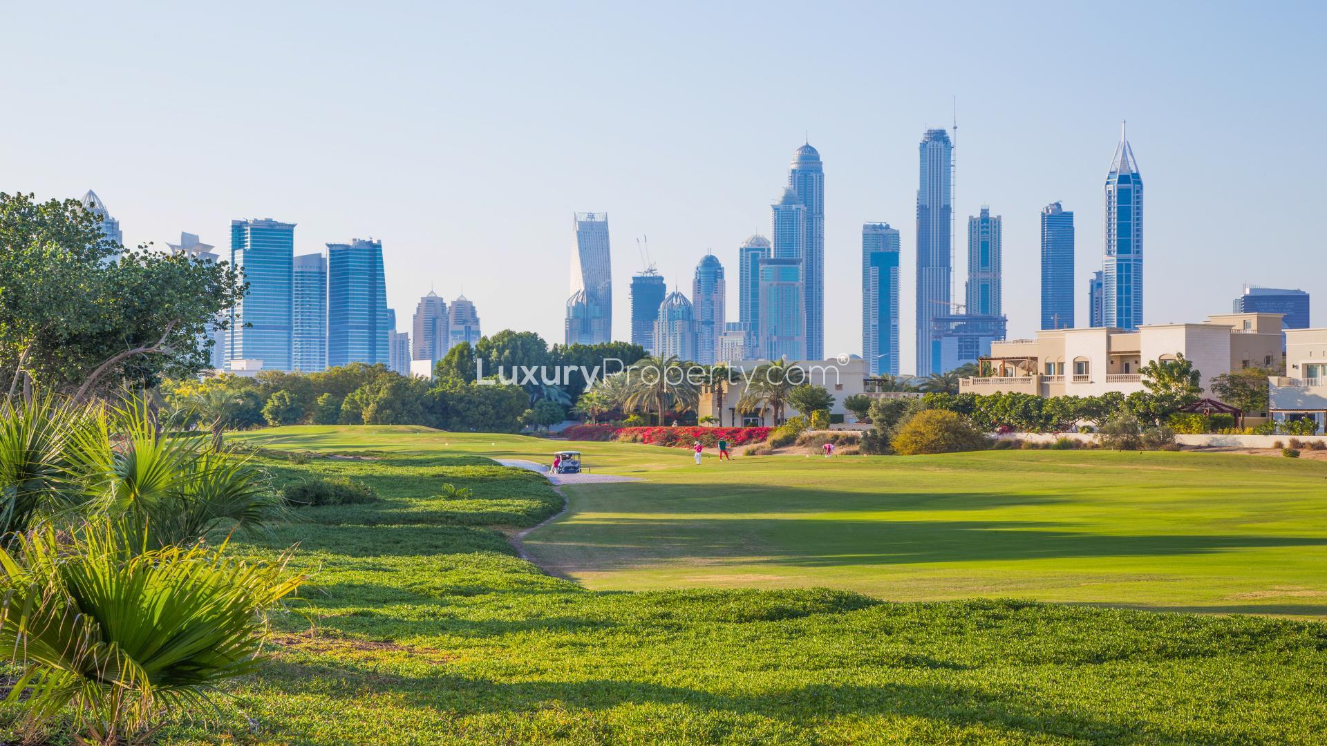 Lakefront view of Emirates Hills residential plots for sale, ideal for luxury home construction