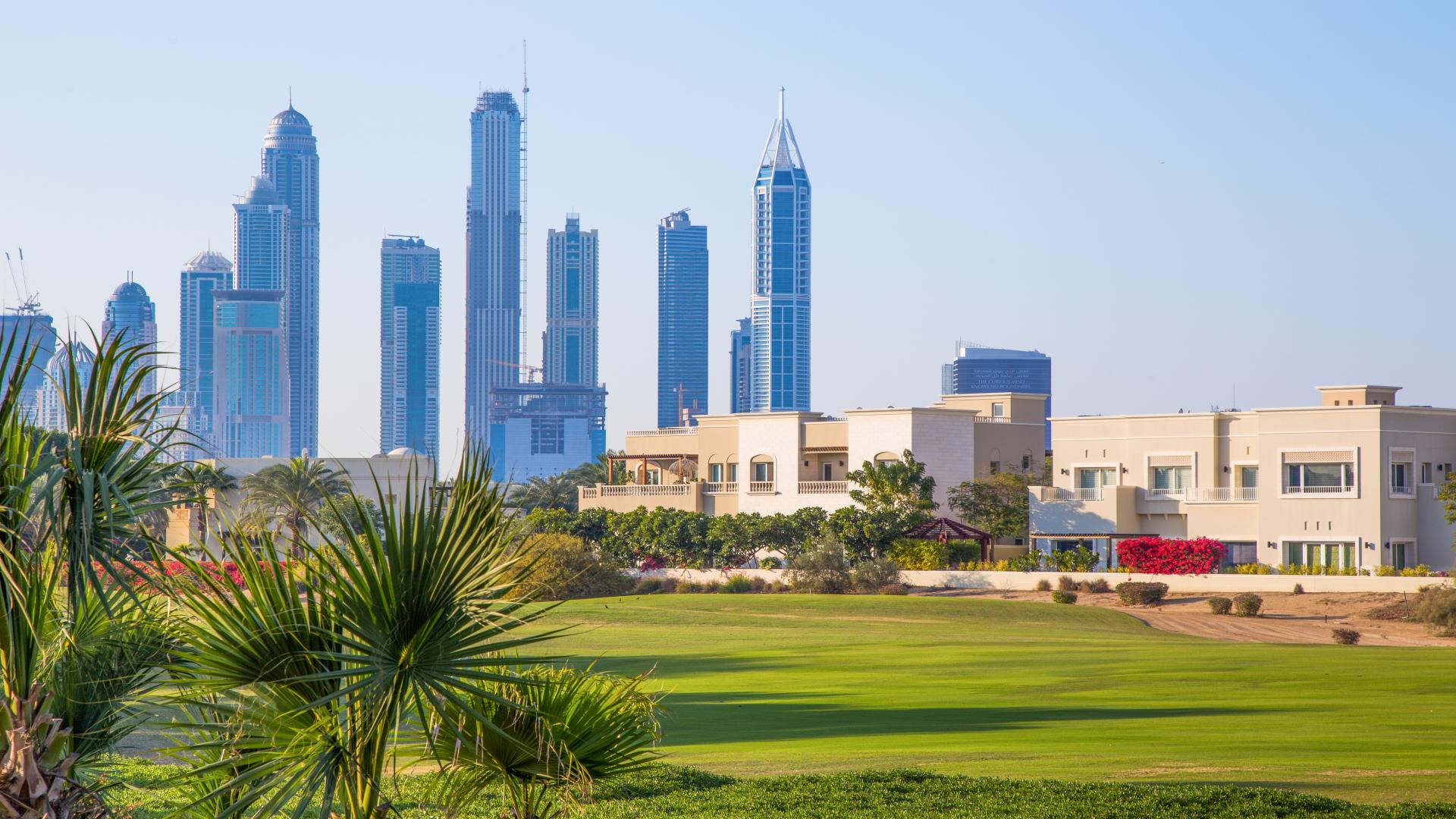 Plot for sale in Emirates Hills with city skyline view, perfect for dream home build