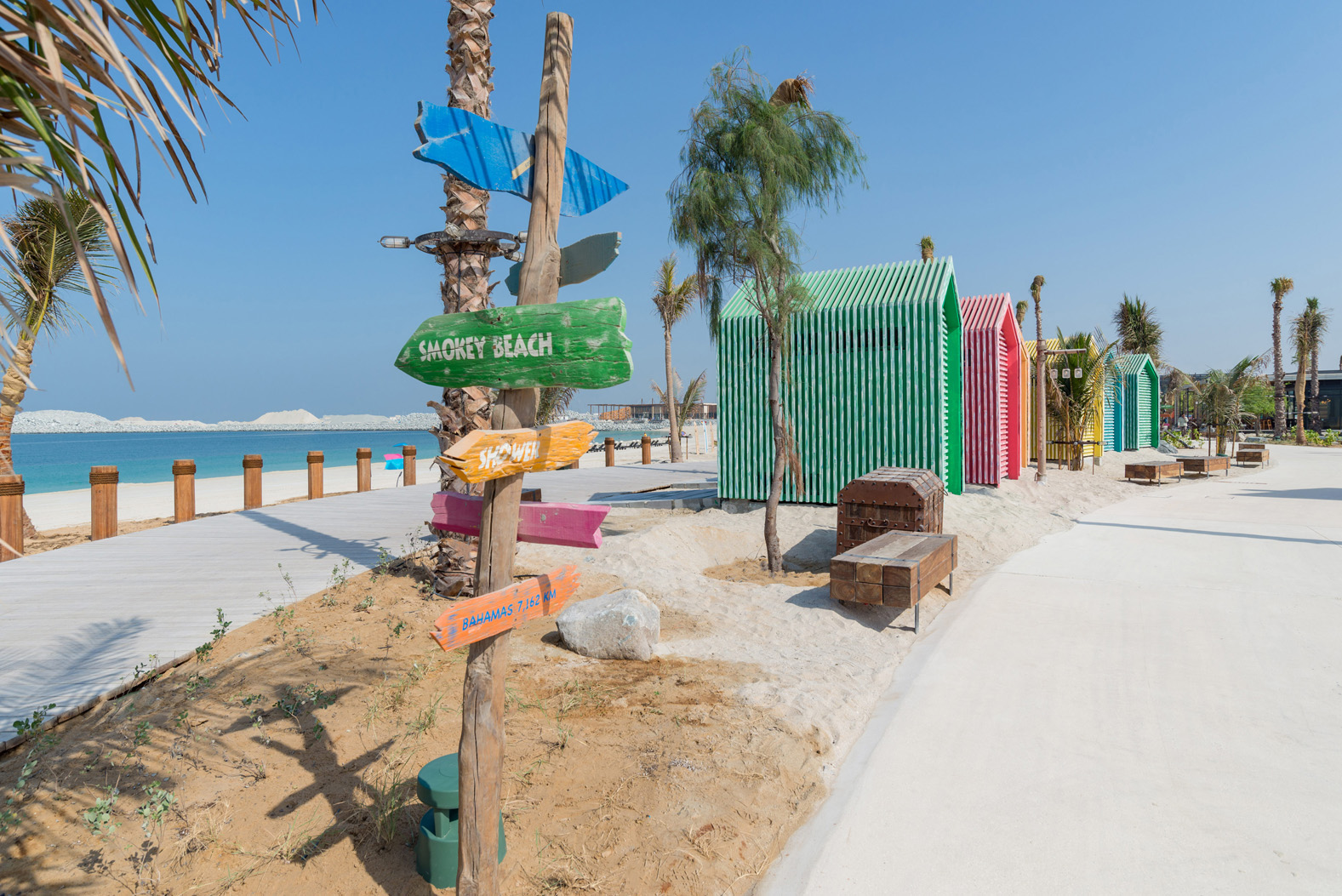Colorful boats on sandy beach, La Mer South, Jumeirah, near lovely corner plot for sale
