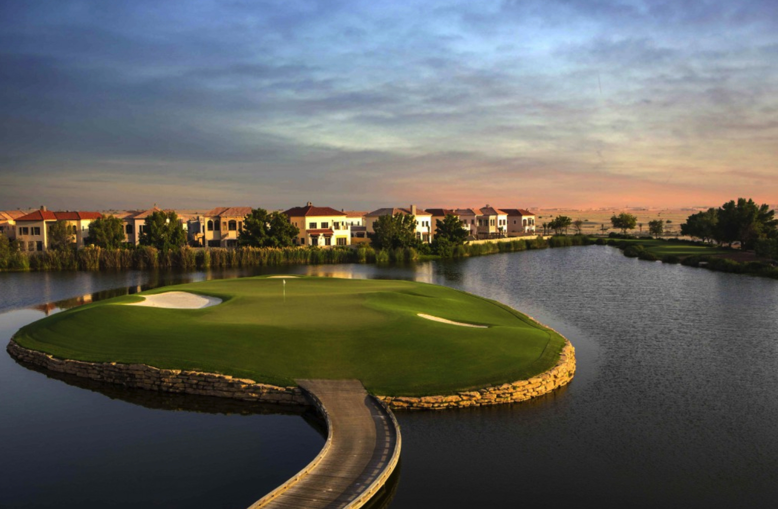 Aerial view of Jumeirah Golf Estates Fire community with stunning landscape and skyline backdrop