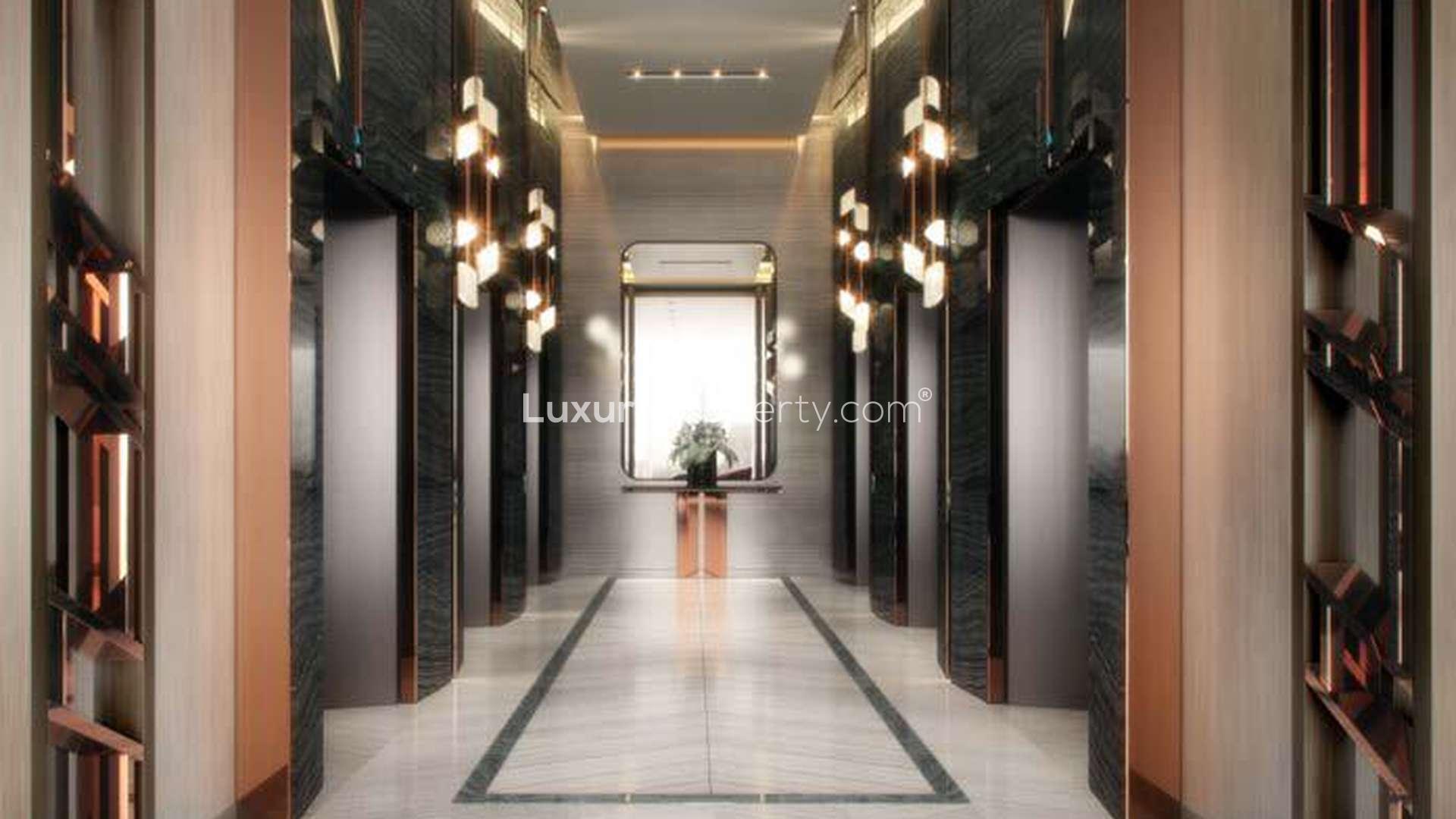 Luxurious lobby in Radisson Dubai DAMAC Hills, featuring elegant design and modern lighting