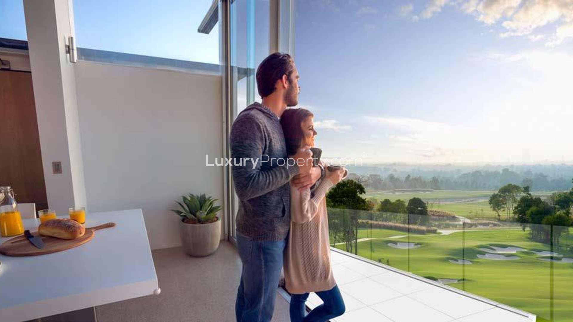 Luxurious bedroom in Radisson Dubai suite with golf course view, Damac Hills