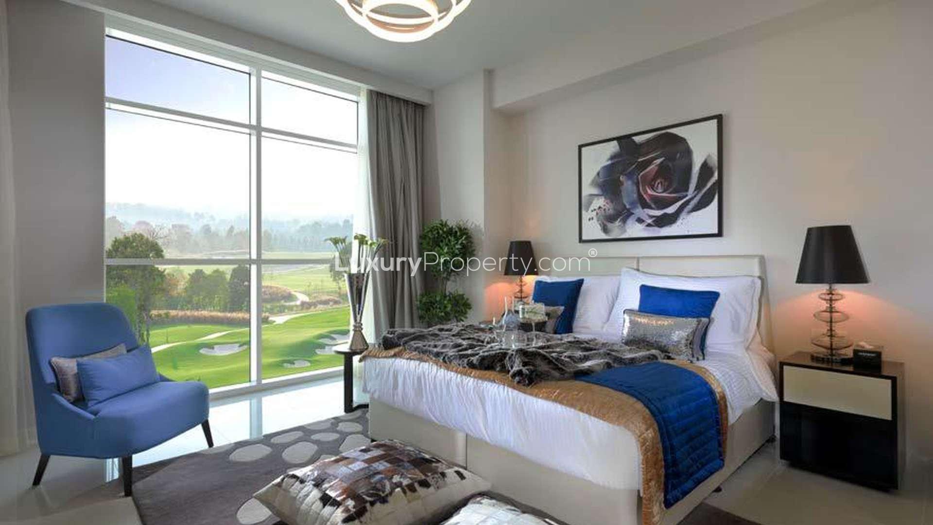 Luxury living room in 2-bedroom suite, Radisson Dubai DAMAC Hills, with golf course view