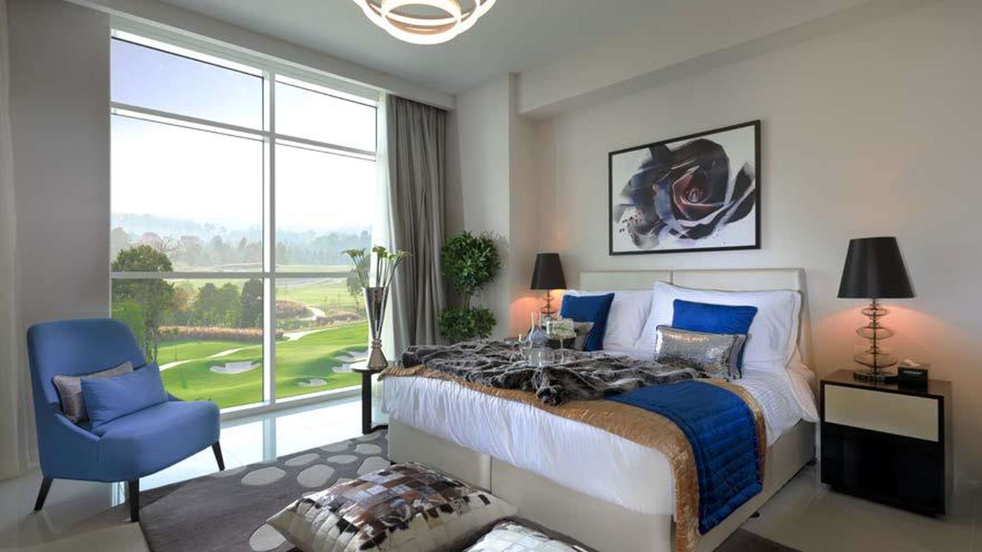 Luxury living room in 2-bedroom suite, Radisson Dubai DAMAC Hills, with golf course view