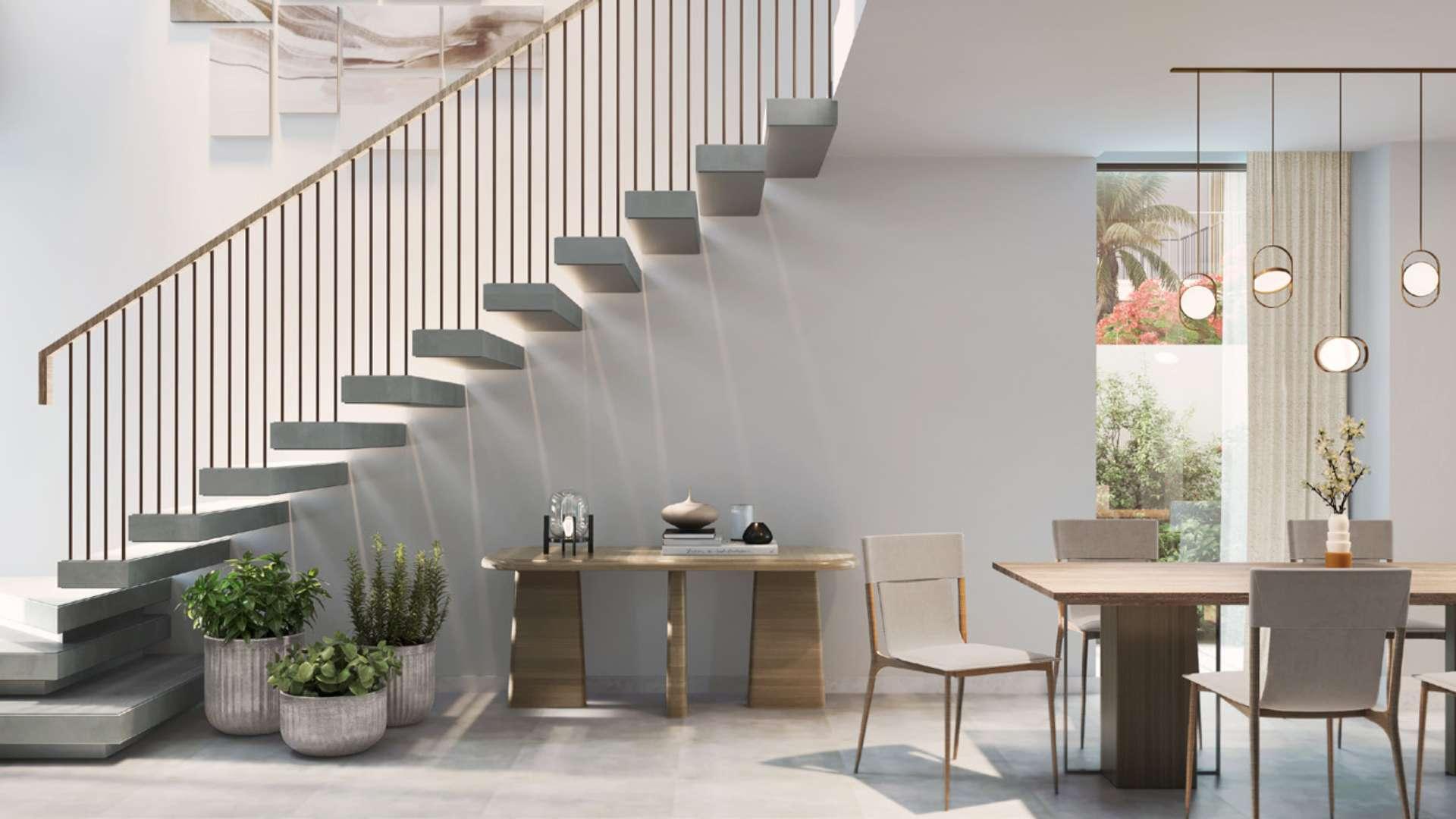 Modern studio townhouse interior with open living area and garden view at Orania, The Valley