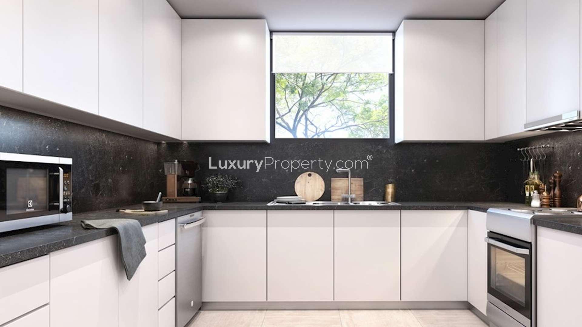 Modern living room and kitchen in Sarab Luxury Townhouse, Aljada, Sharjah for sale