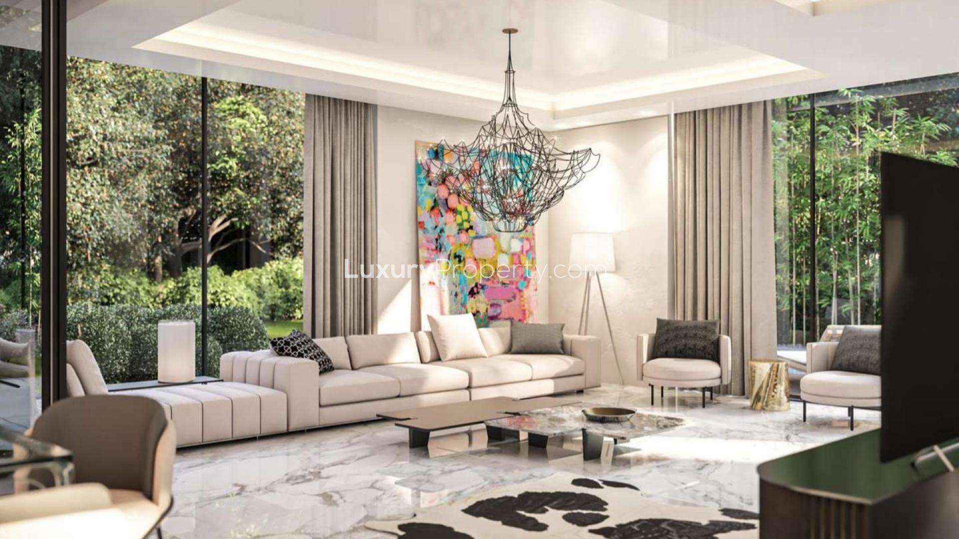 Contemporary living room in Chorisia 1 Villa, Al Barari, with modern decor and garden view