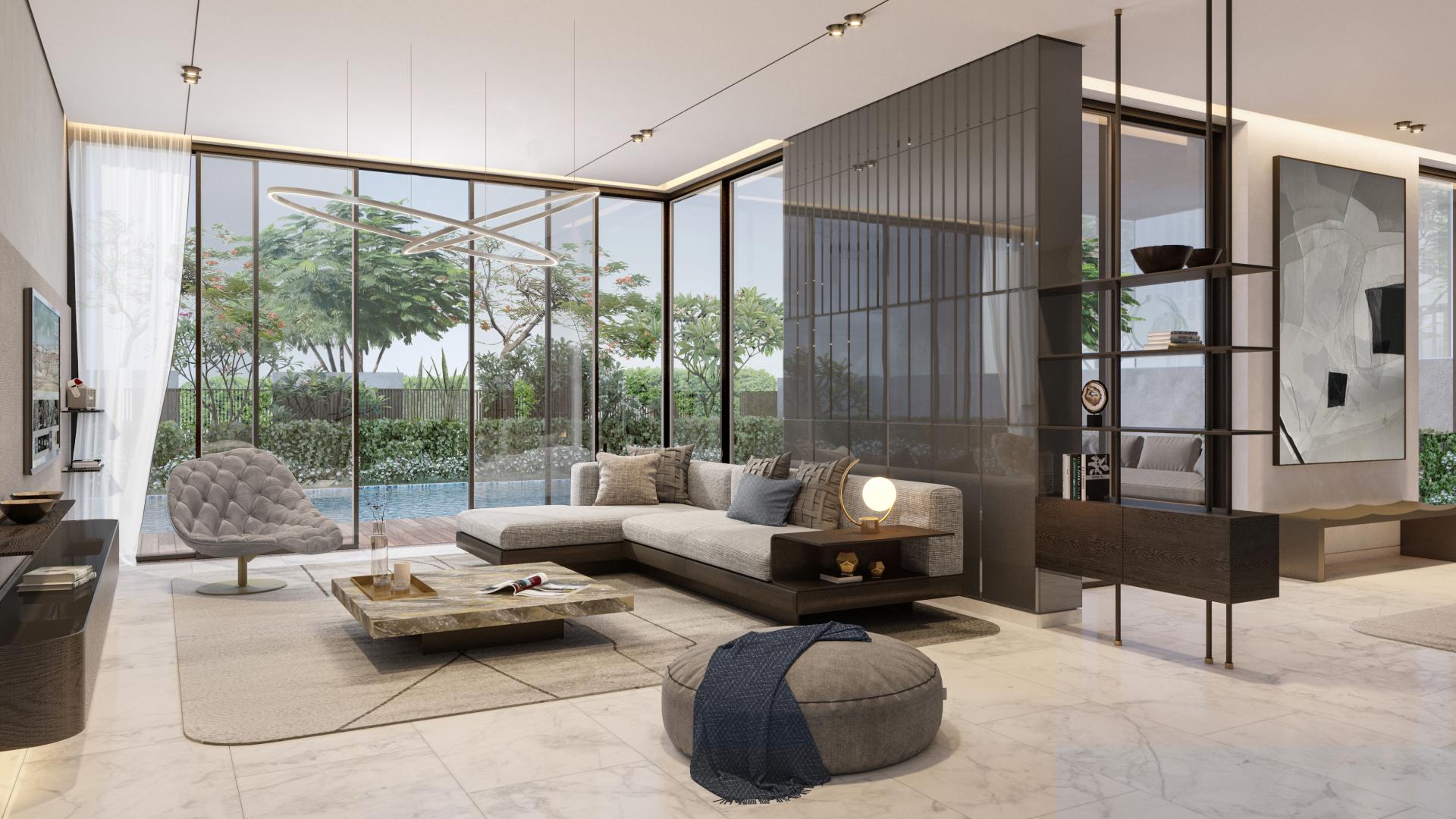 Contemporary 5-bedroom villa exterior in Harmony, Tilal Al Ghaf, featuring lush landscaping