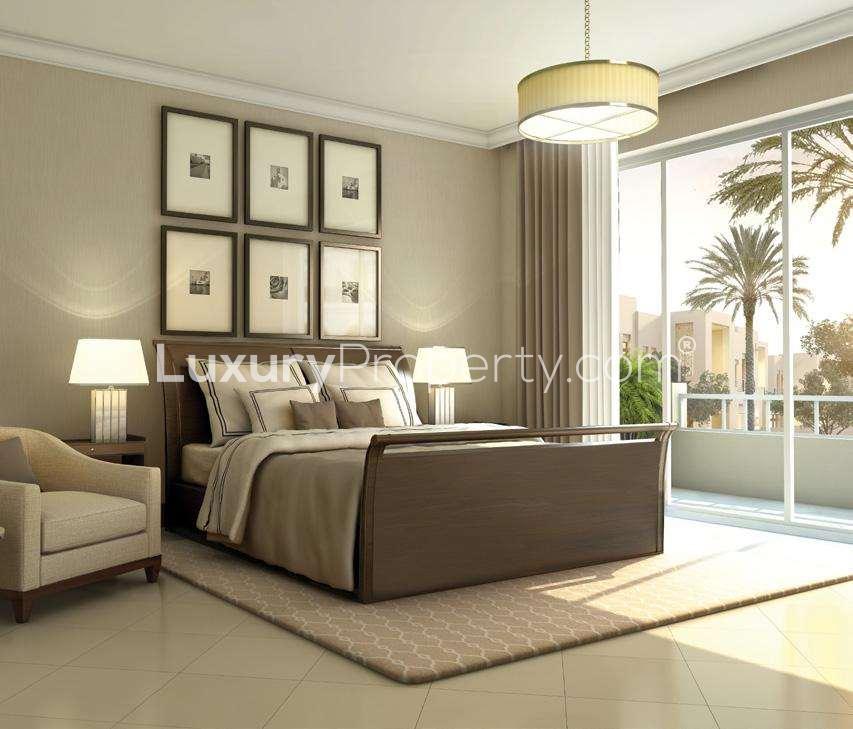 Modern bathroom in Mira Oasis villa, featuring elegant cabinetry and spacious shower area