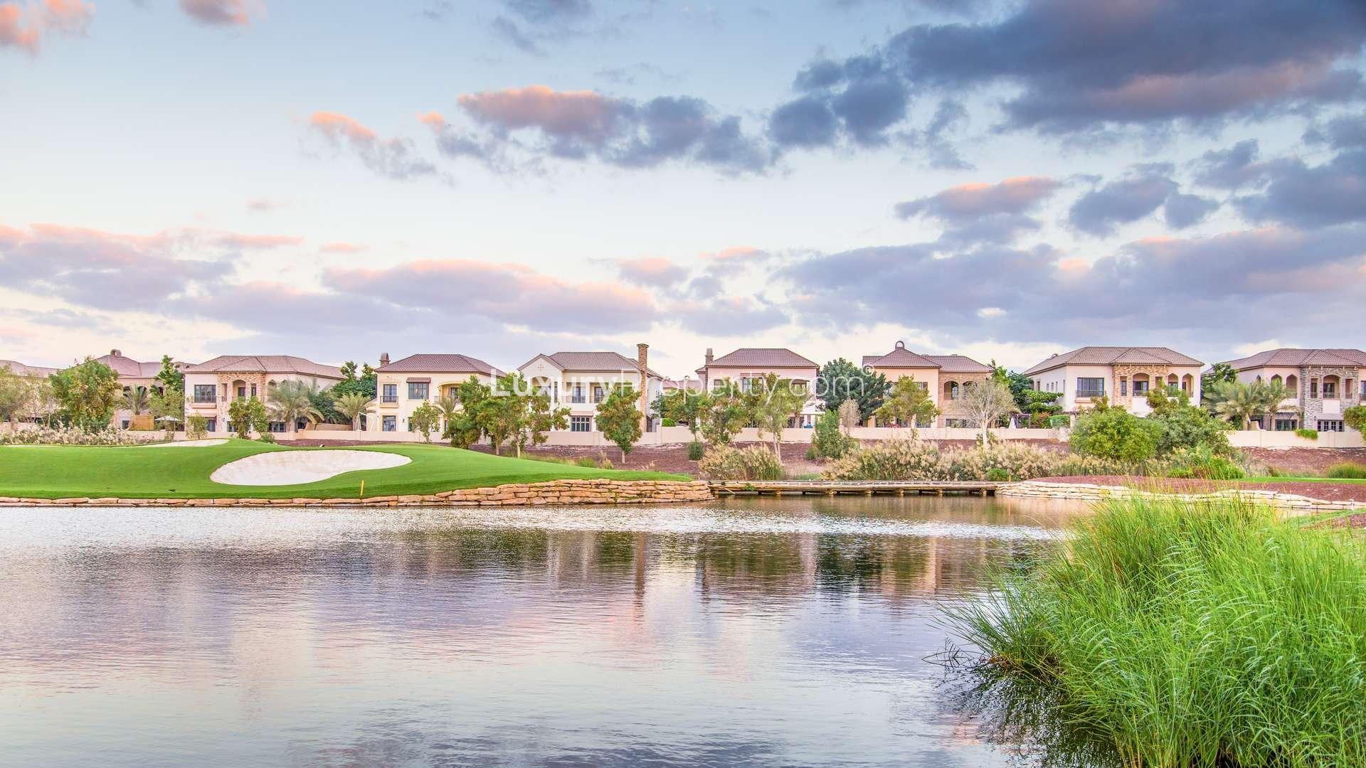 Villa community view with lake and gardens in Jumeirah Golf Estates, Fire sub-community