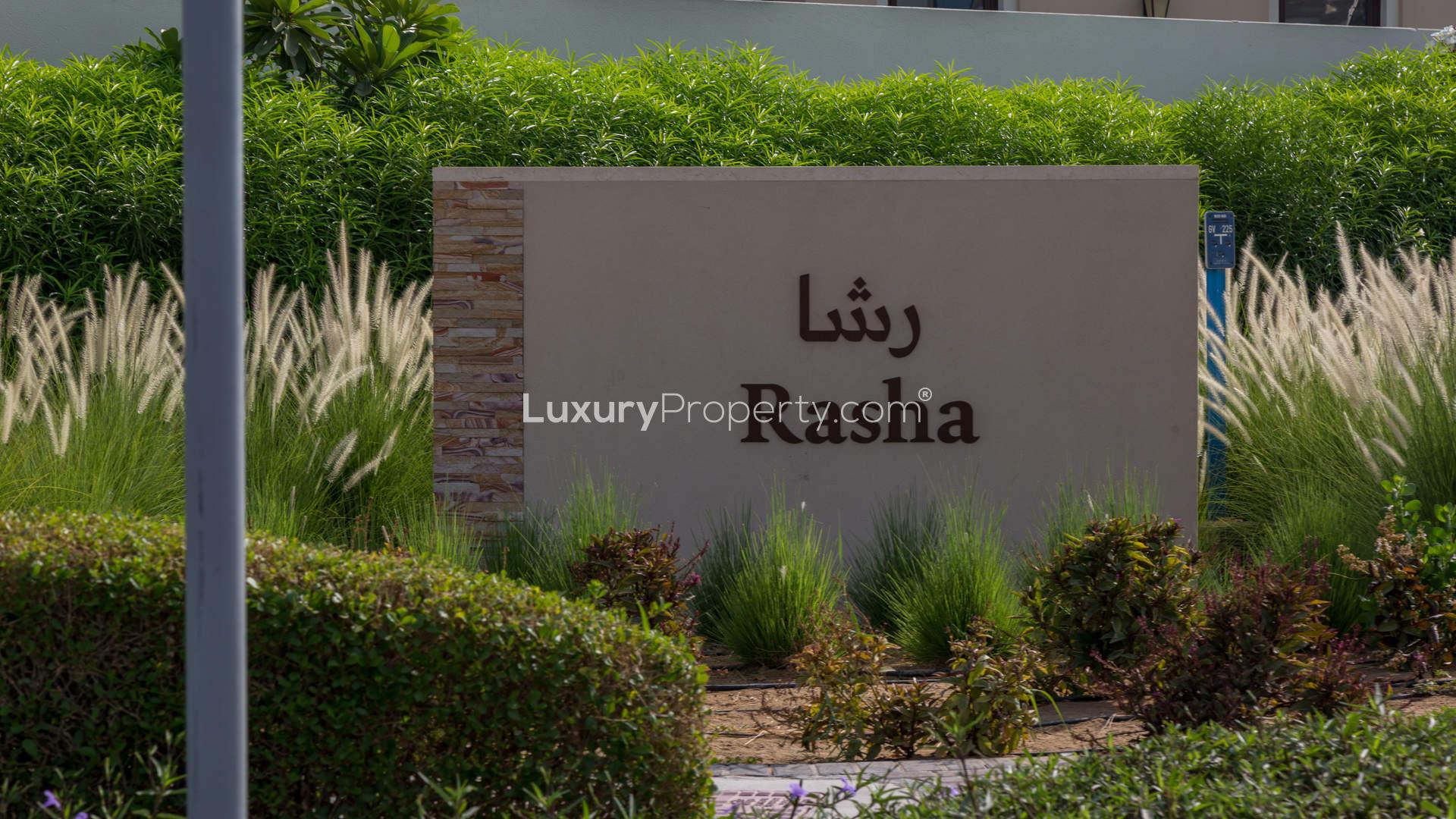 Luxury Rasha Villas poolside view in Arabian Ranches 2, showcasing elegant Spanish style residences